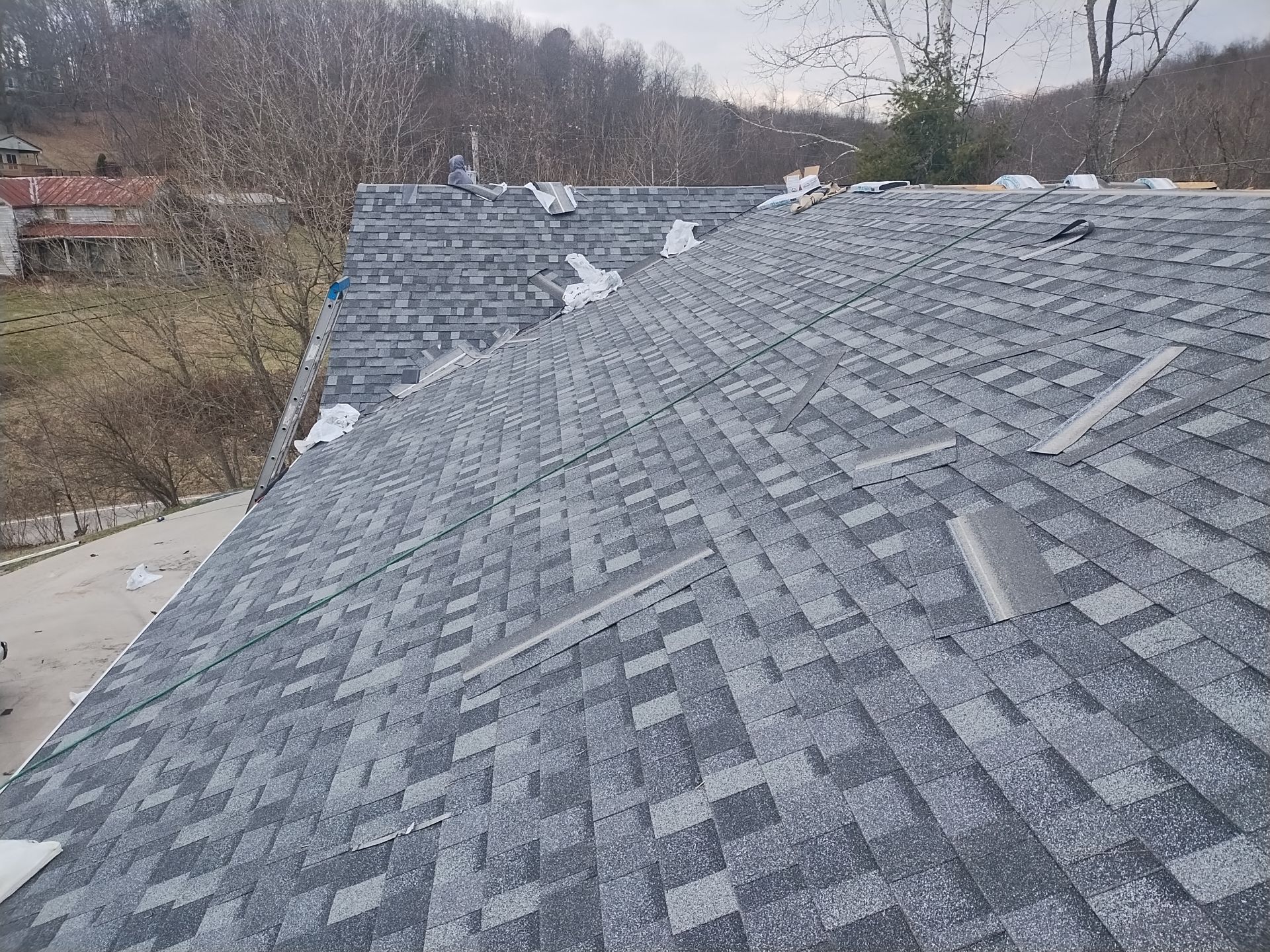 Residential Roofing Installation using Performance Shingles by Mr. Roofer