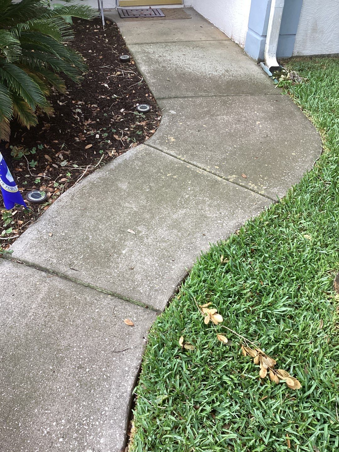 Driveway and Garage using Tidal Wave by Amvet concrete coatings llc