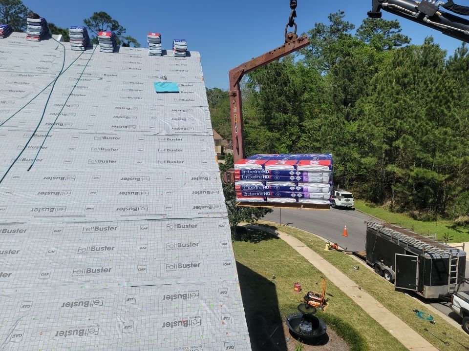 Residential Roofing Installation using Roof Replacement by American Roofing & Construction LLC