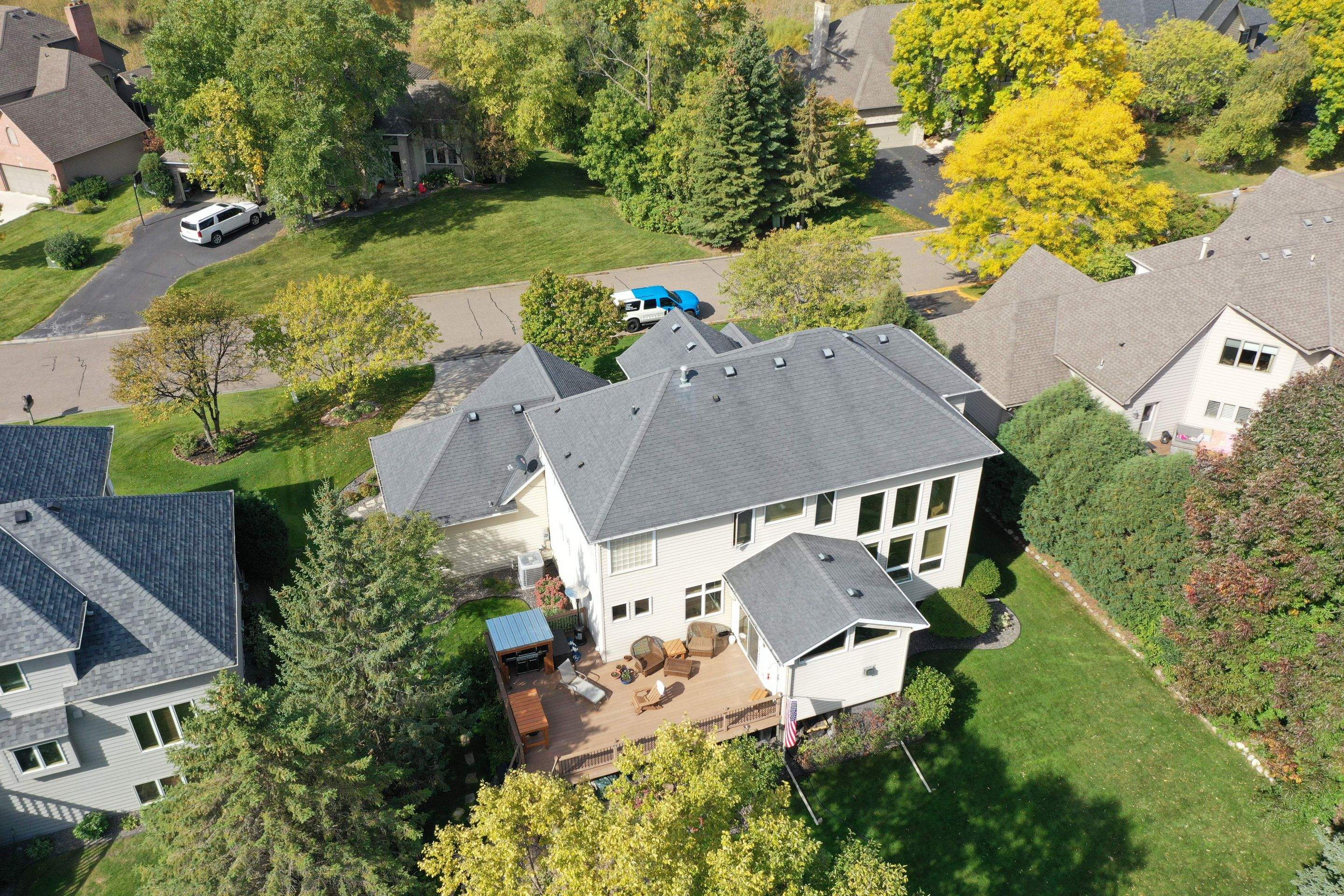 Residential Roofing Installation using Certainteed Landmark Moire Black by MODERN EXTERIOR SYSTEMS