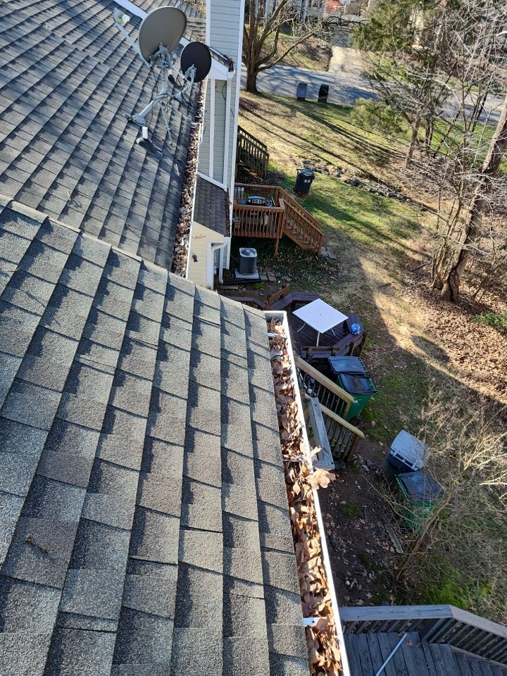 Gutter Cleaning using water by Power Wash Masters LLC