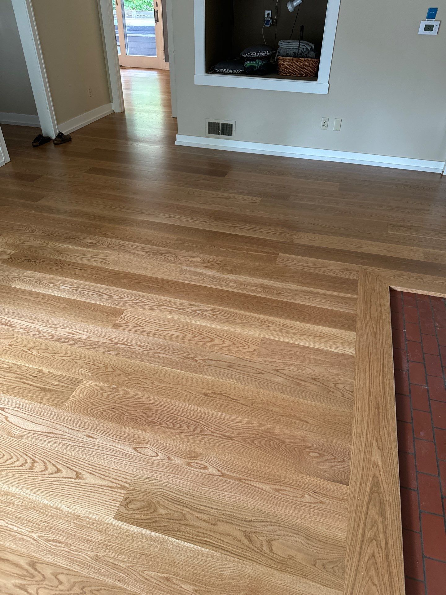 Hardwood flooring installation using White Oak 7" Select by Ann Arbor Hardwoods