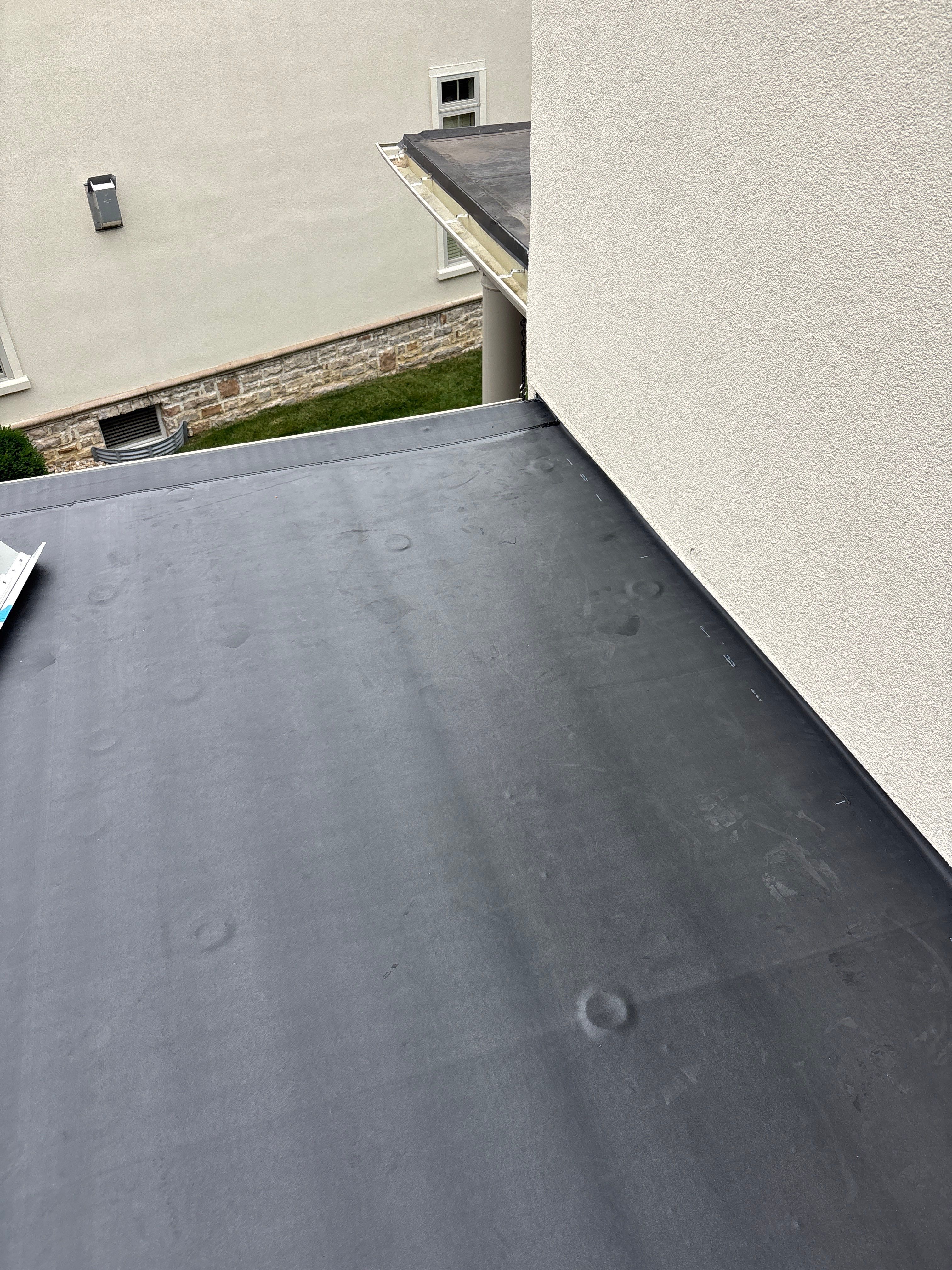 Rubber Roof Repair by KFX Roofing