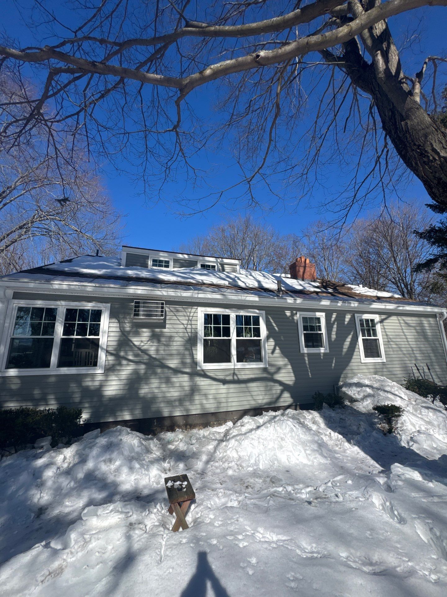 Snow/Ice Belt & Ice Dam Removal Project in Woburn by Mighty Dog Roofing of Greater Middlesex County