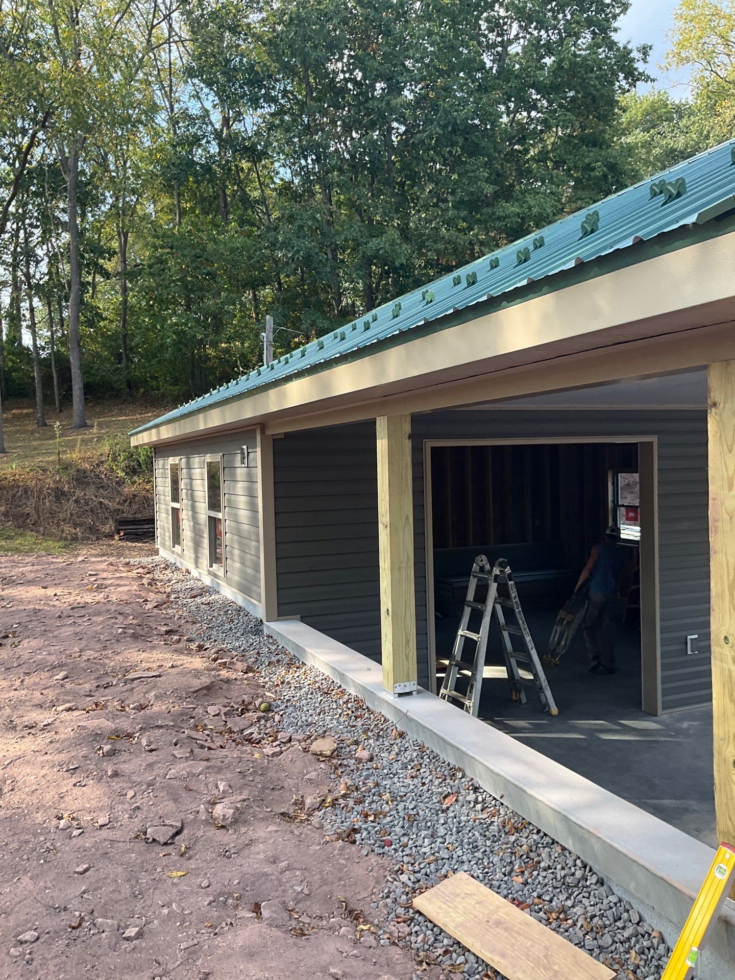 Detached Garage Construction with Vinyl Siding and Metal Roof by Esh Builders