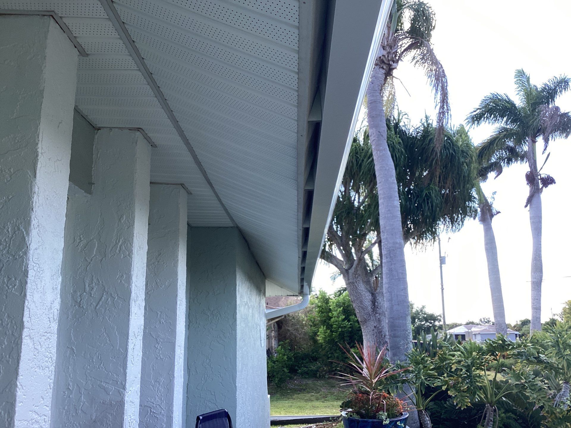 Downspout Installation using 3X4 Elbow Downspout in Cape Coral FL by Gutter Professors