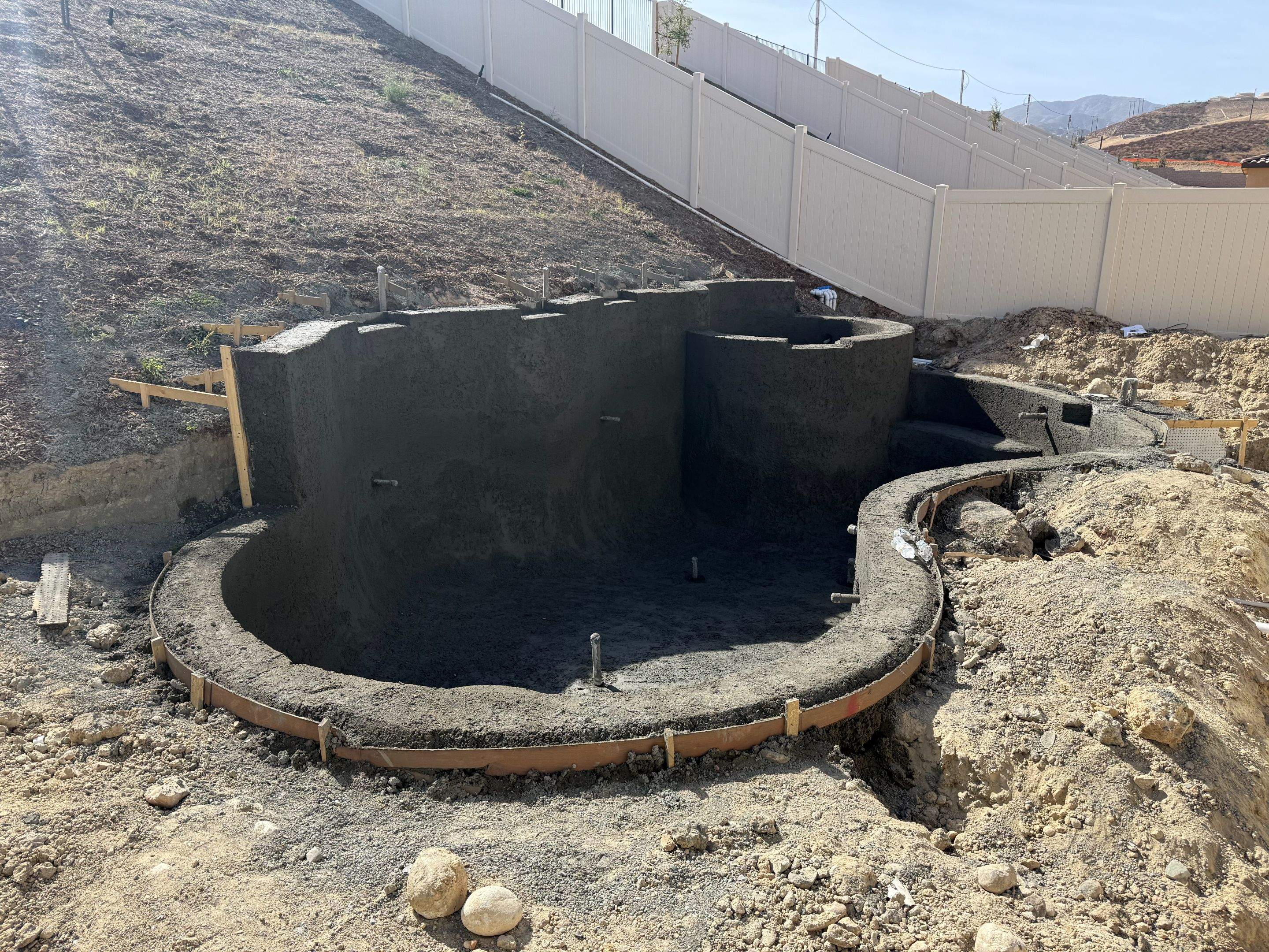 Pool and spa with tall RBB by Premier Pools and Spas Temecula