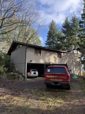 Residential Roof Cleaning in Progress in Bainbridge Island