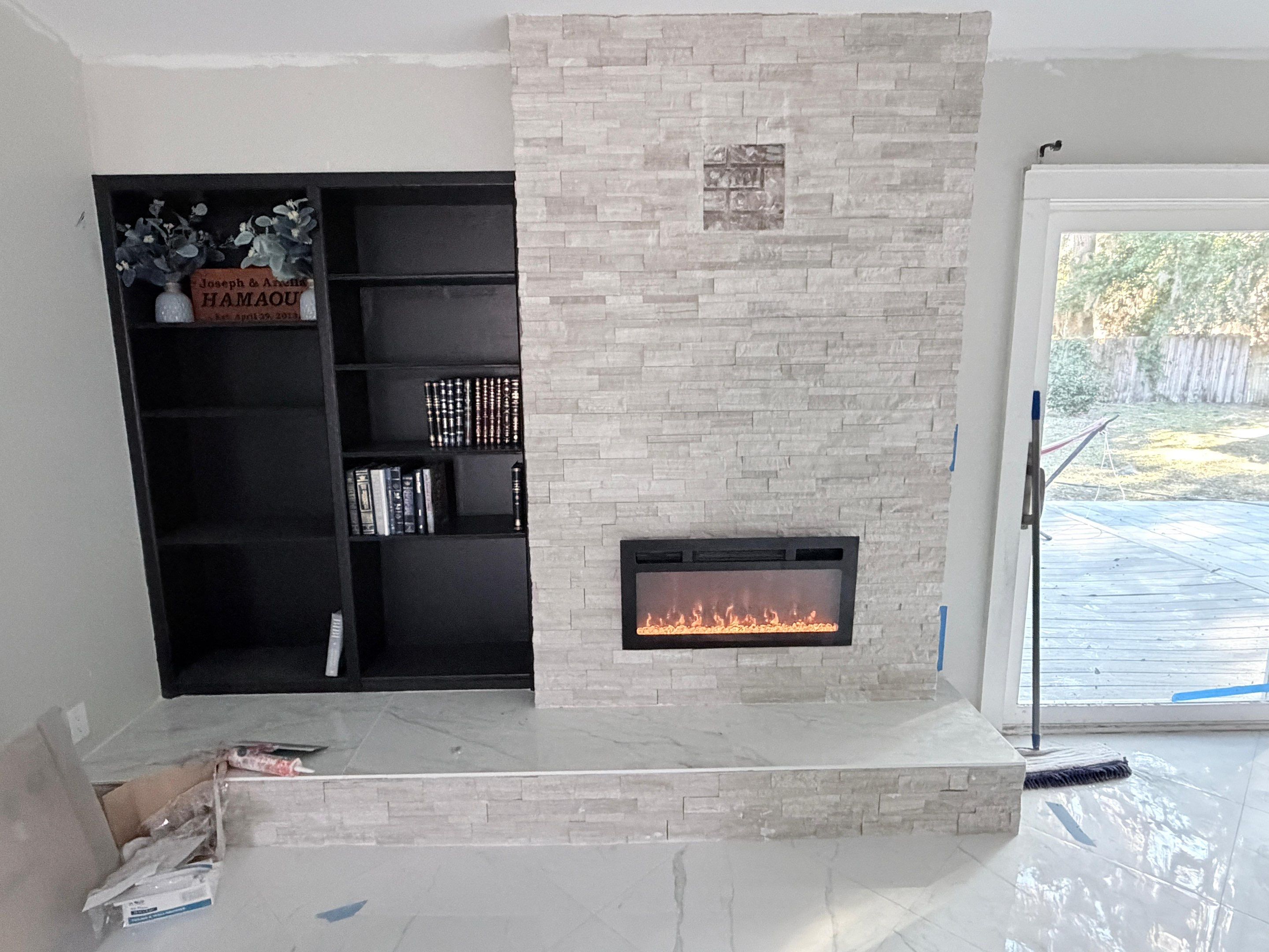 Master Bathroom, Children's Bathroom, and Fireplace Renovation by urban green energy llc