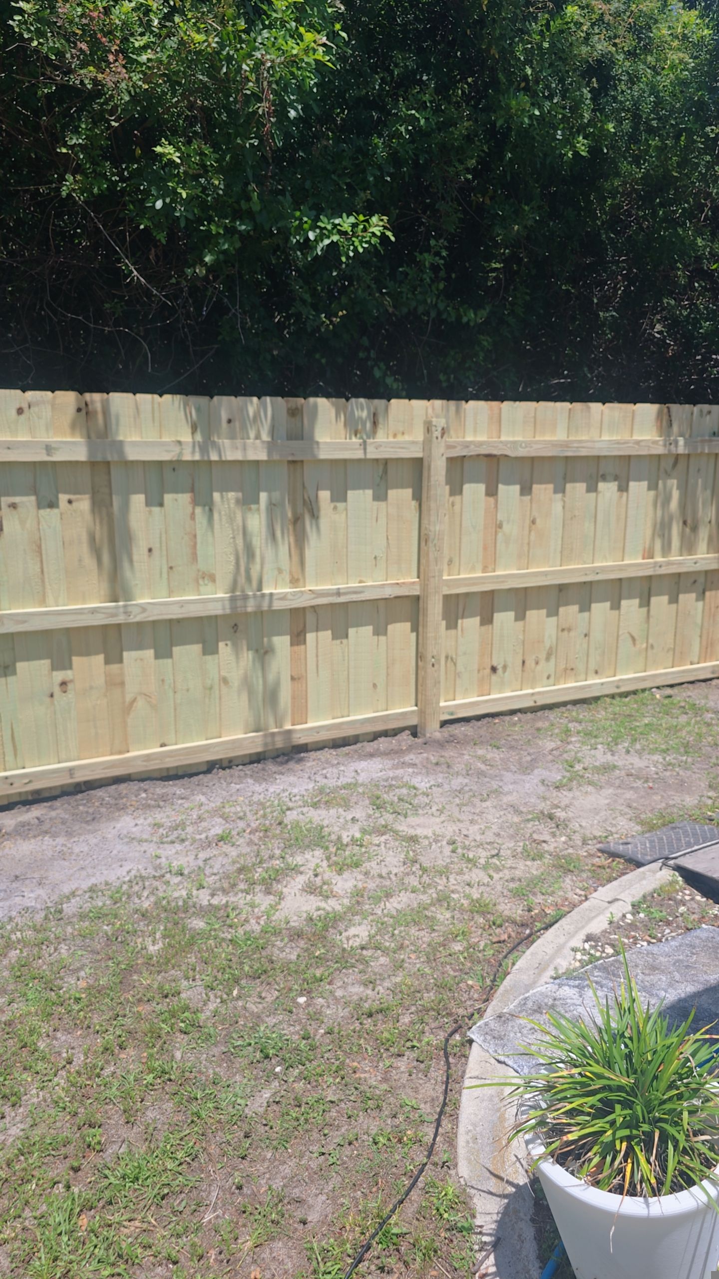 Pressure-Treated Wood Privacy Fence Installation in Port Charlotte by True Fence LLC