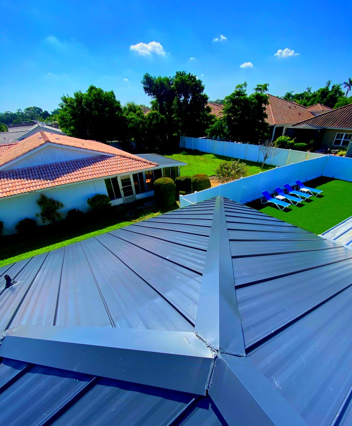 Metal Roofing System by Rooster Roofing, LLC