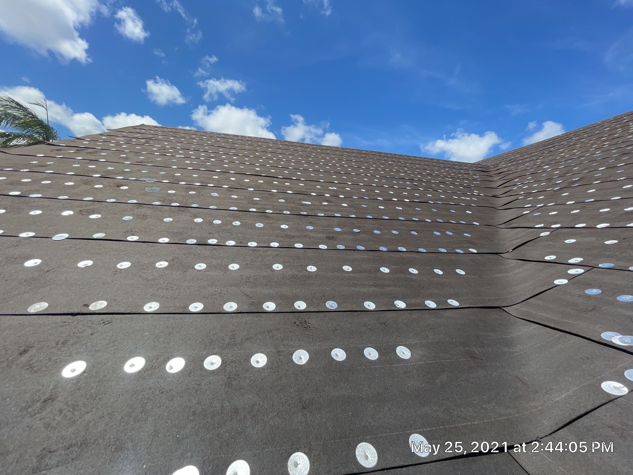 Residential Roofing Installation using 1" Nail strip metal roof by BLUES BROTHERS ROOFING
