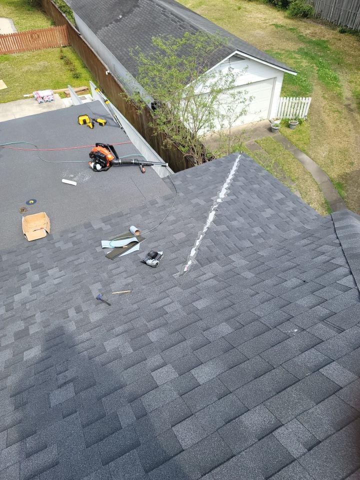 Residential Roofing Installation using Roof Replacement by American Roofing & Construction LLC
