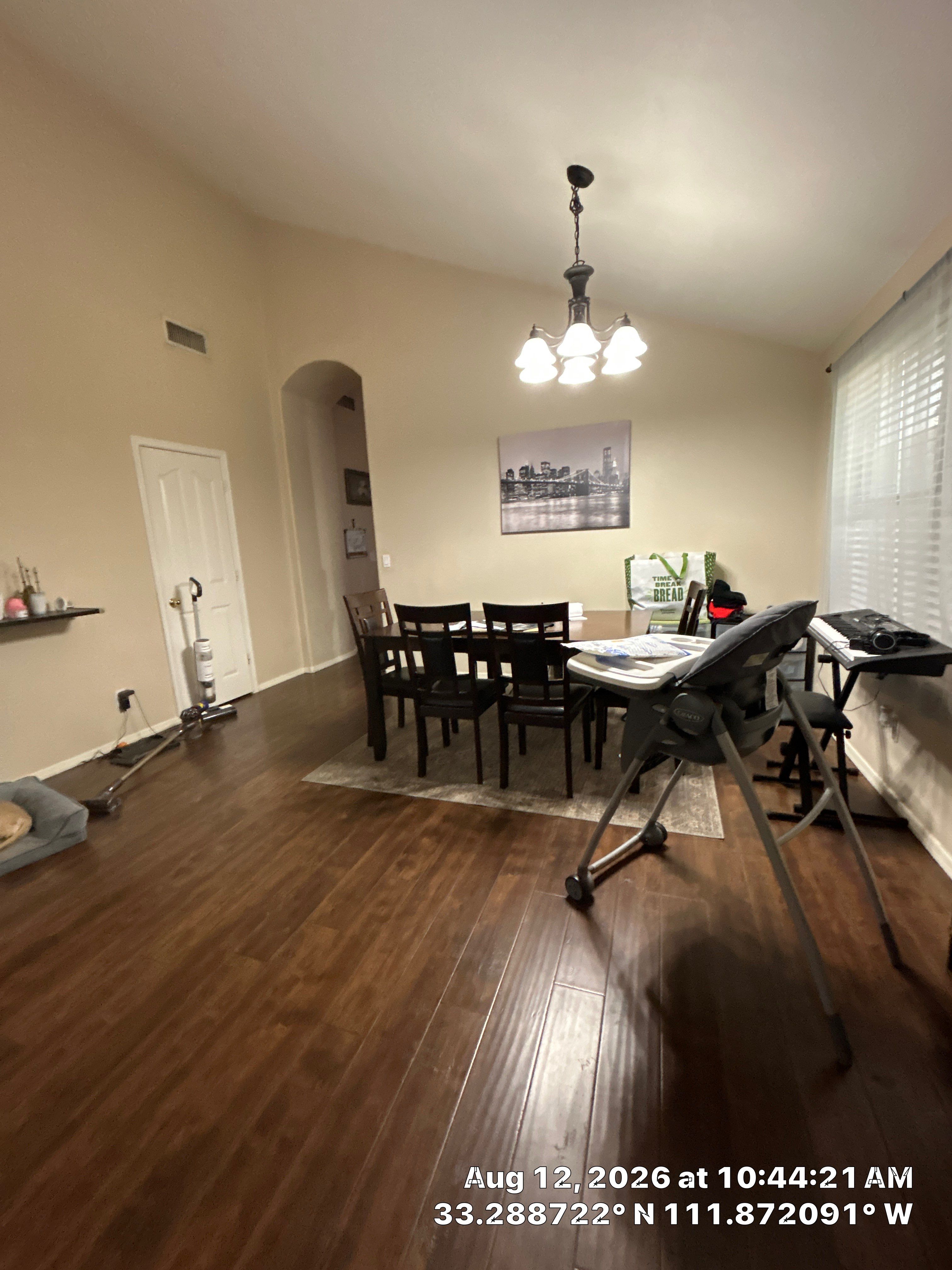 Dark Wood Floor Installation for a Chandler Dining Area by CompanyCam Sales Demo