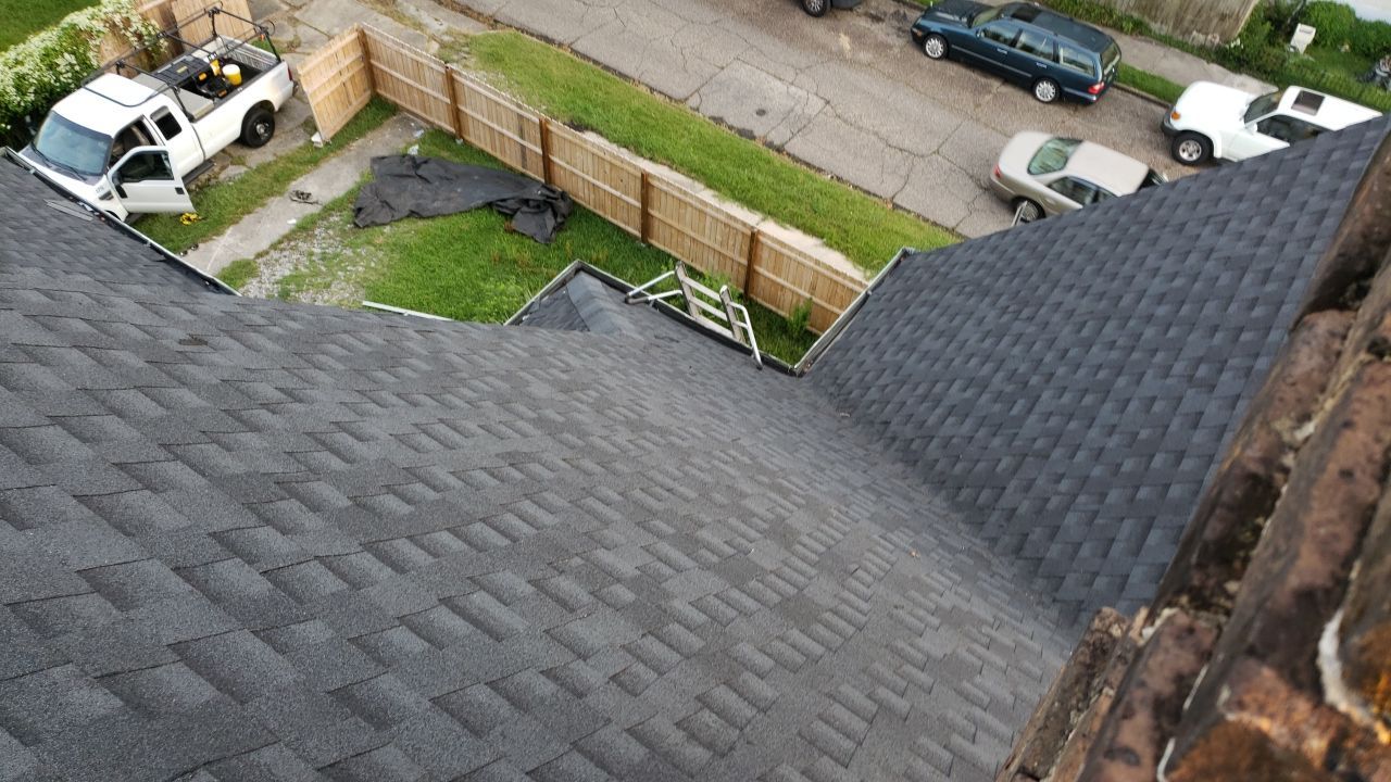 Residential Roofing Installation using Roof Replacement by American Roofing & Construction LLC