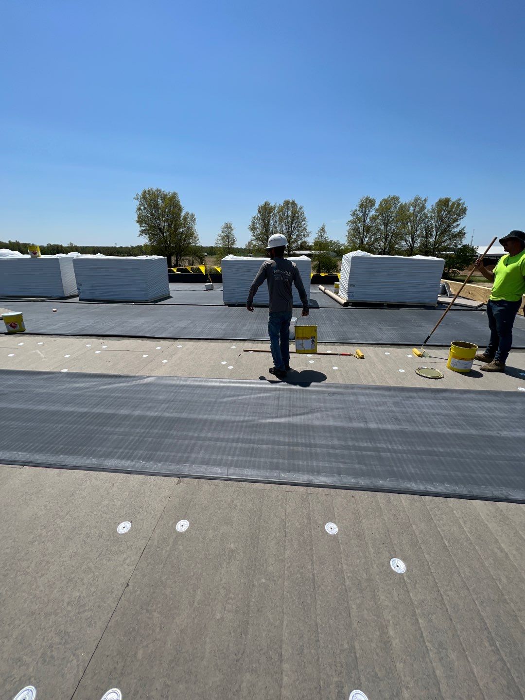 Commercial Roofing Installation using 60 mil rubber roof  by Nitro Roofing and Construction