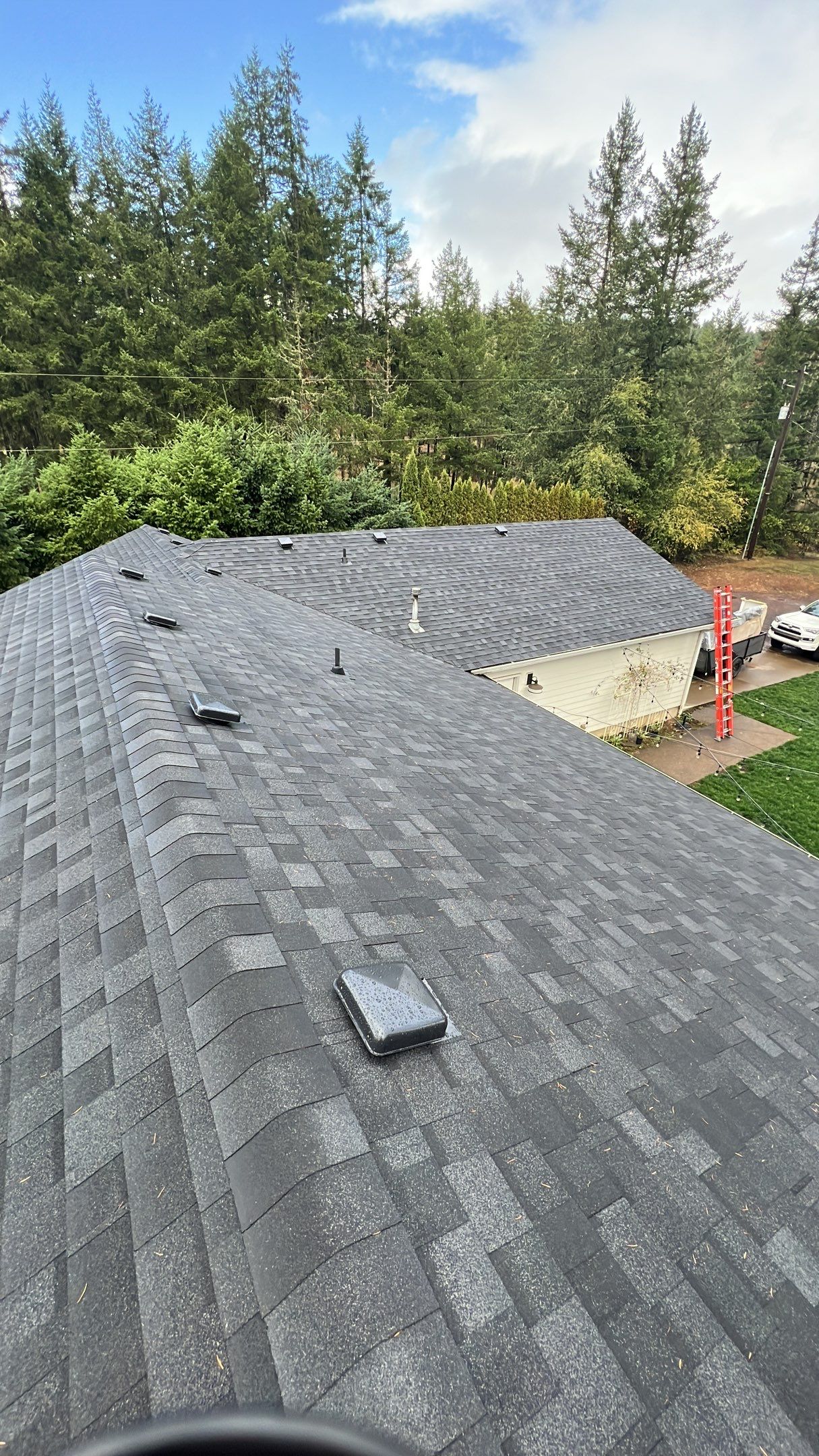 Residential Roofing Installation using IKO Dynasty (Color: Granite Black) by Orezona Building & Roofing Company, Inc.