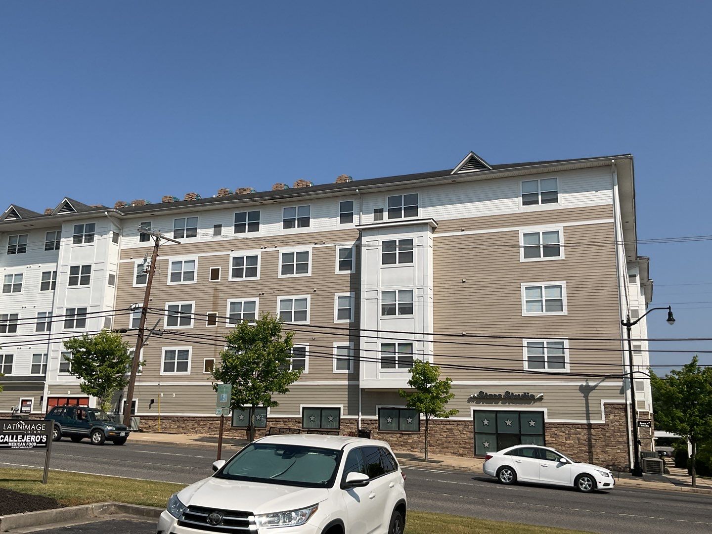 Multi-Family Commercial shingle roof by Alpha Design Services