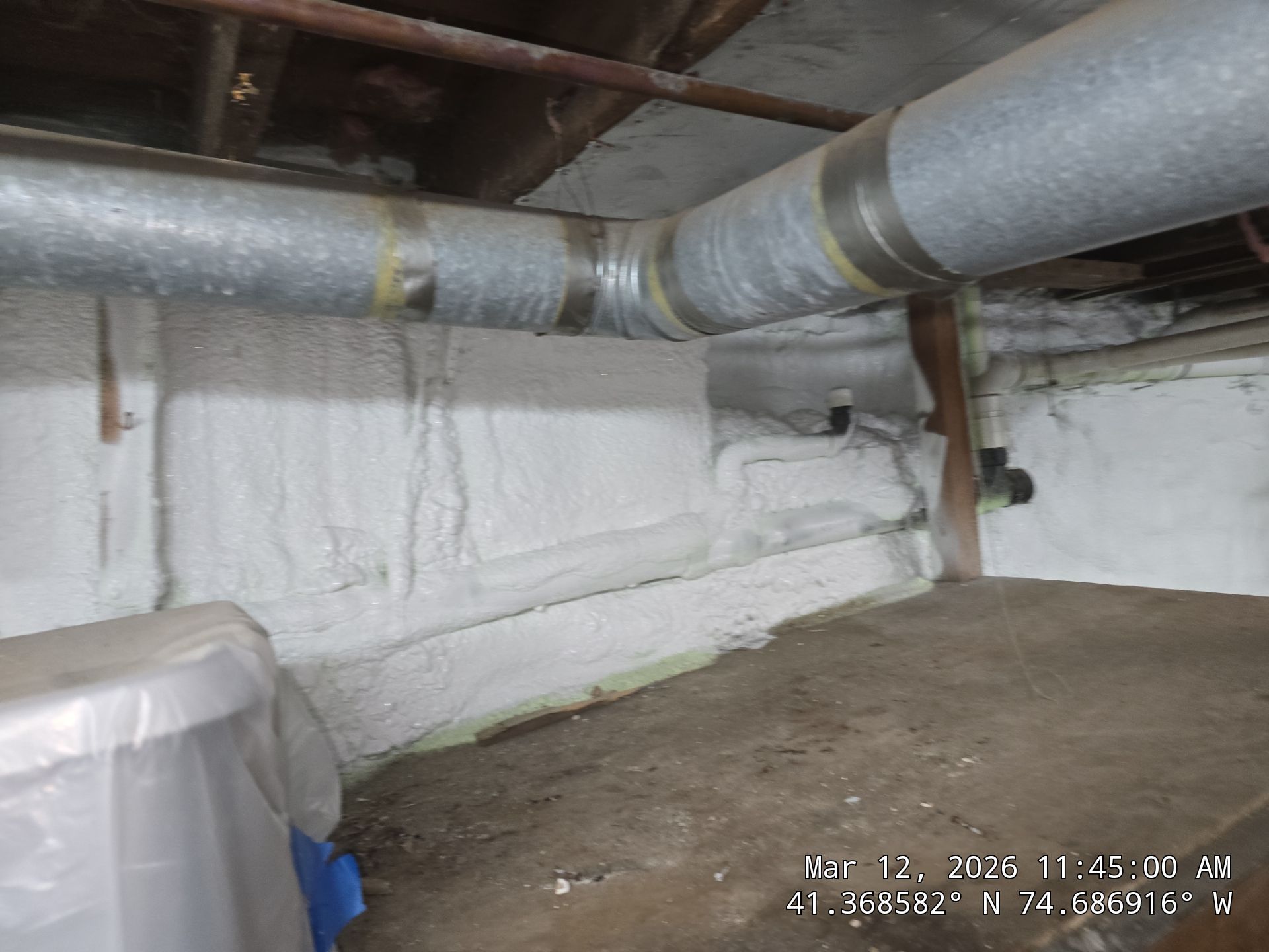 Basement Exterior Walls using Closed Cell Spray Foam by NYS Foam & Energy