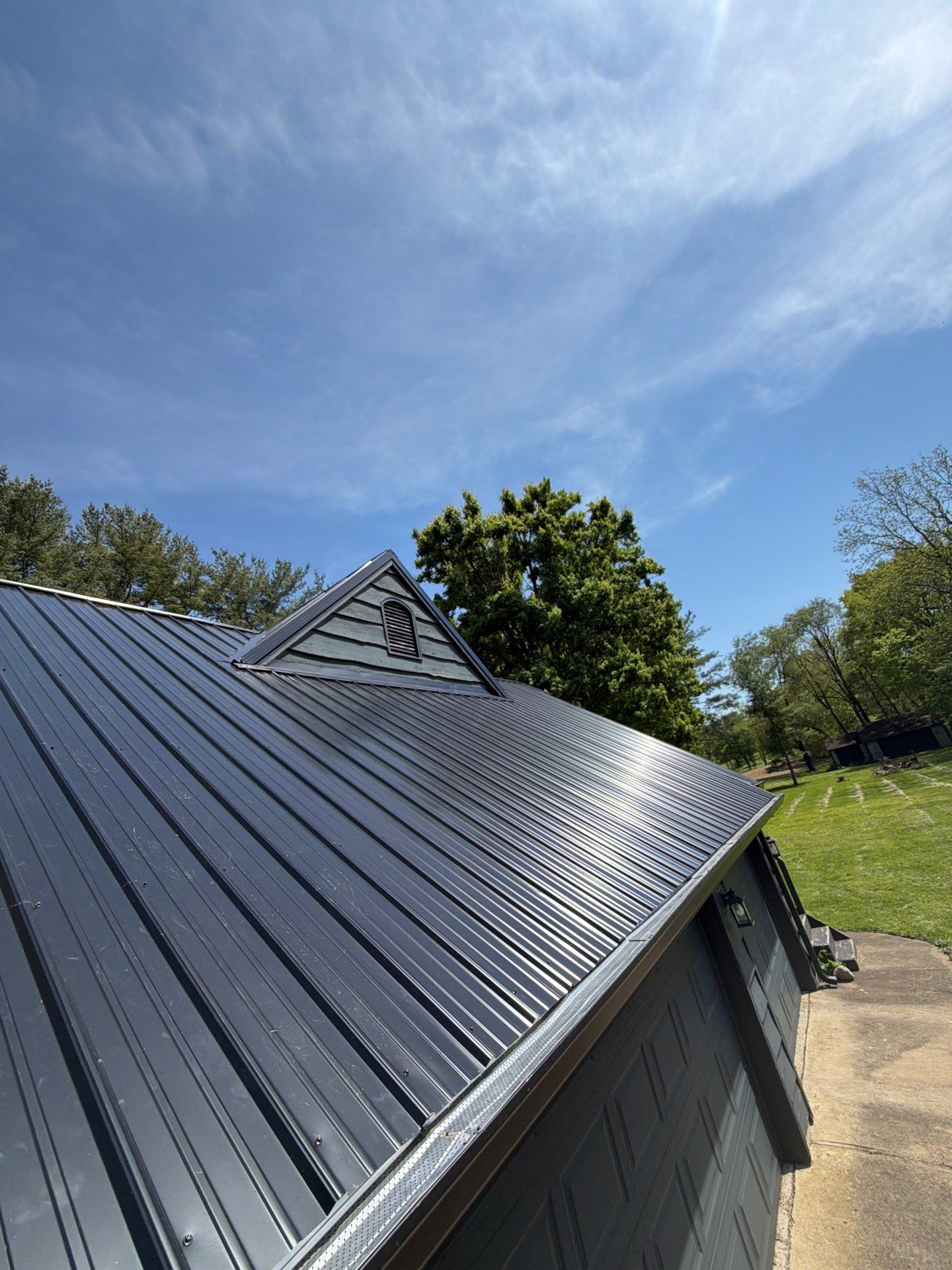 Classic Rib Metal Roofing - Shiny Black by Hoel Roofing & Remodeling