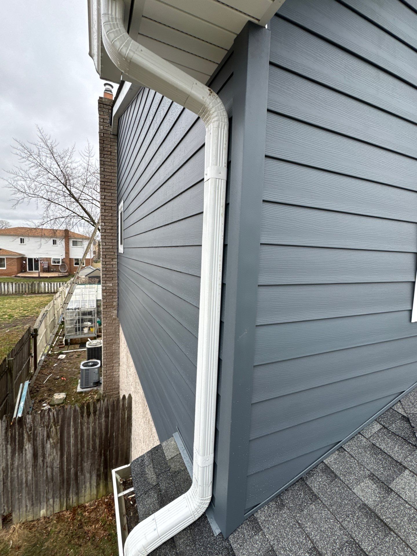 Siding Replacement using Alside Midnight Blue by 180 Contractors