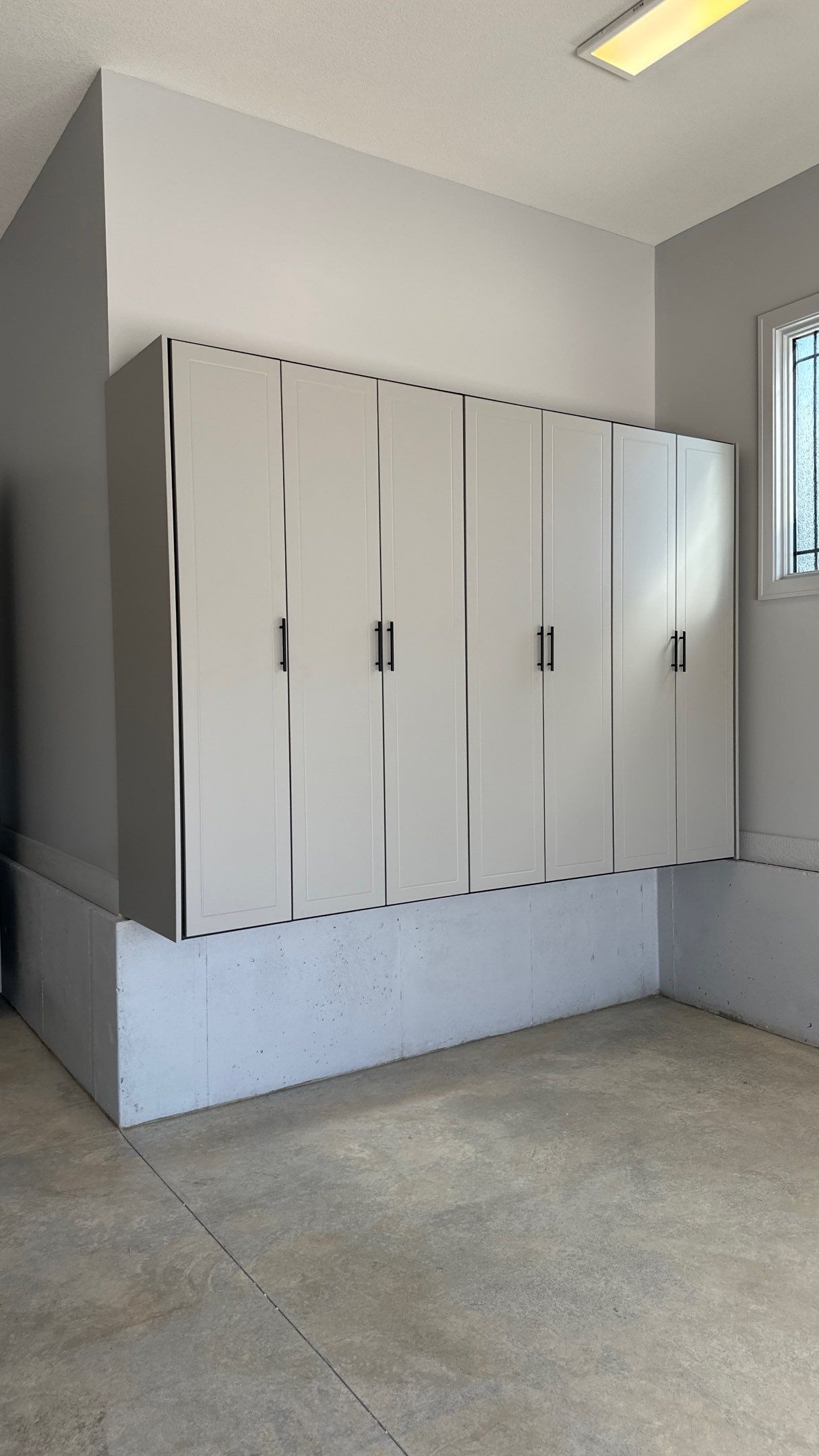 Tom S. made storage a priority in his garage  by Banner Garage