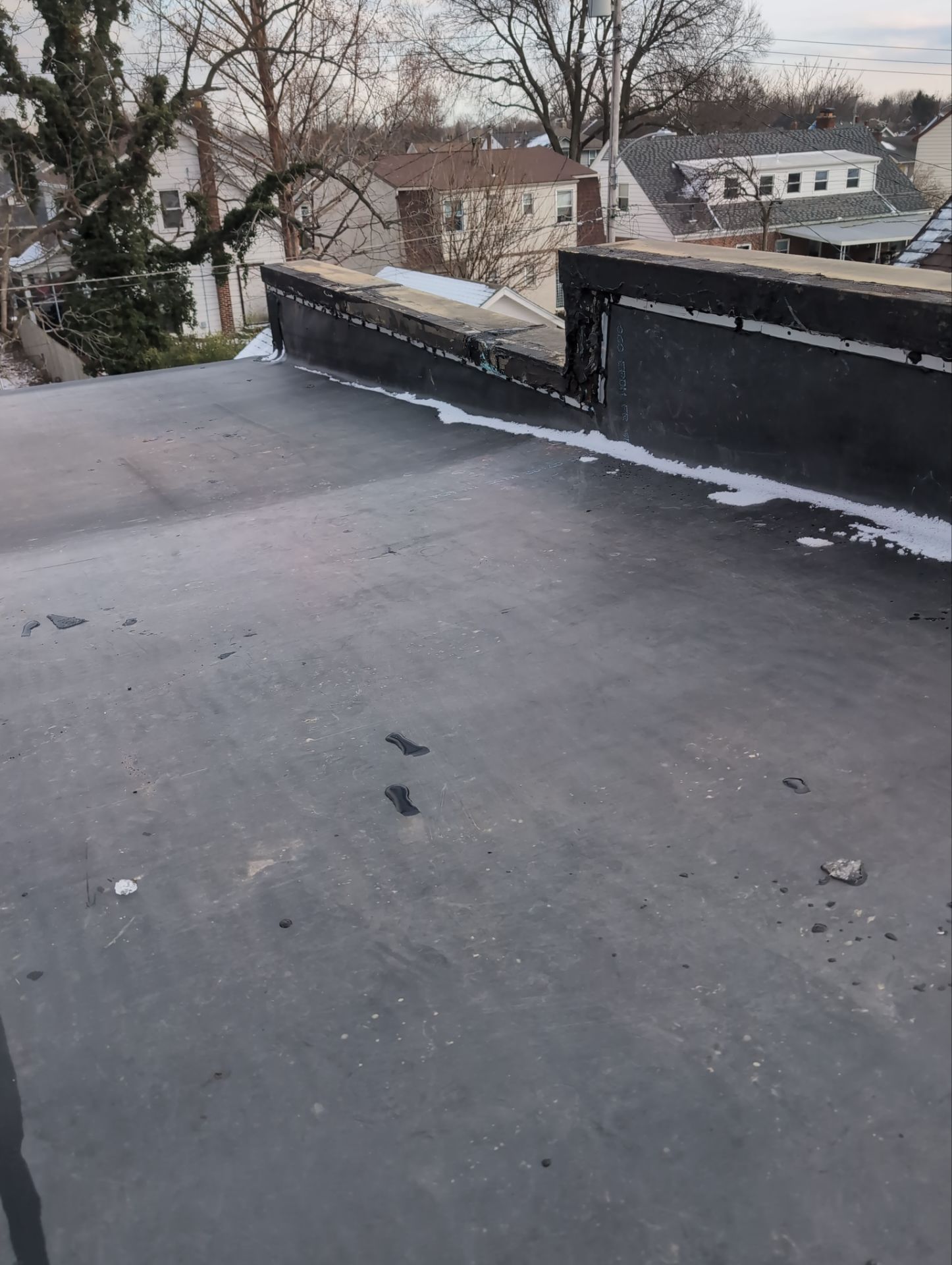 Commercial Flat Roof Replacement by Nitro Roofing and Construction