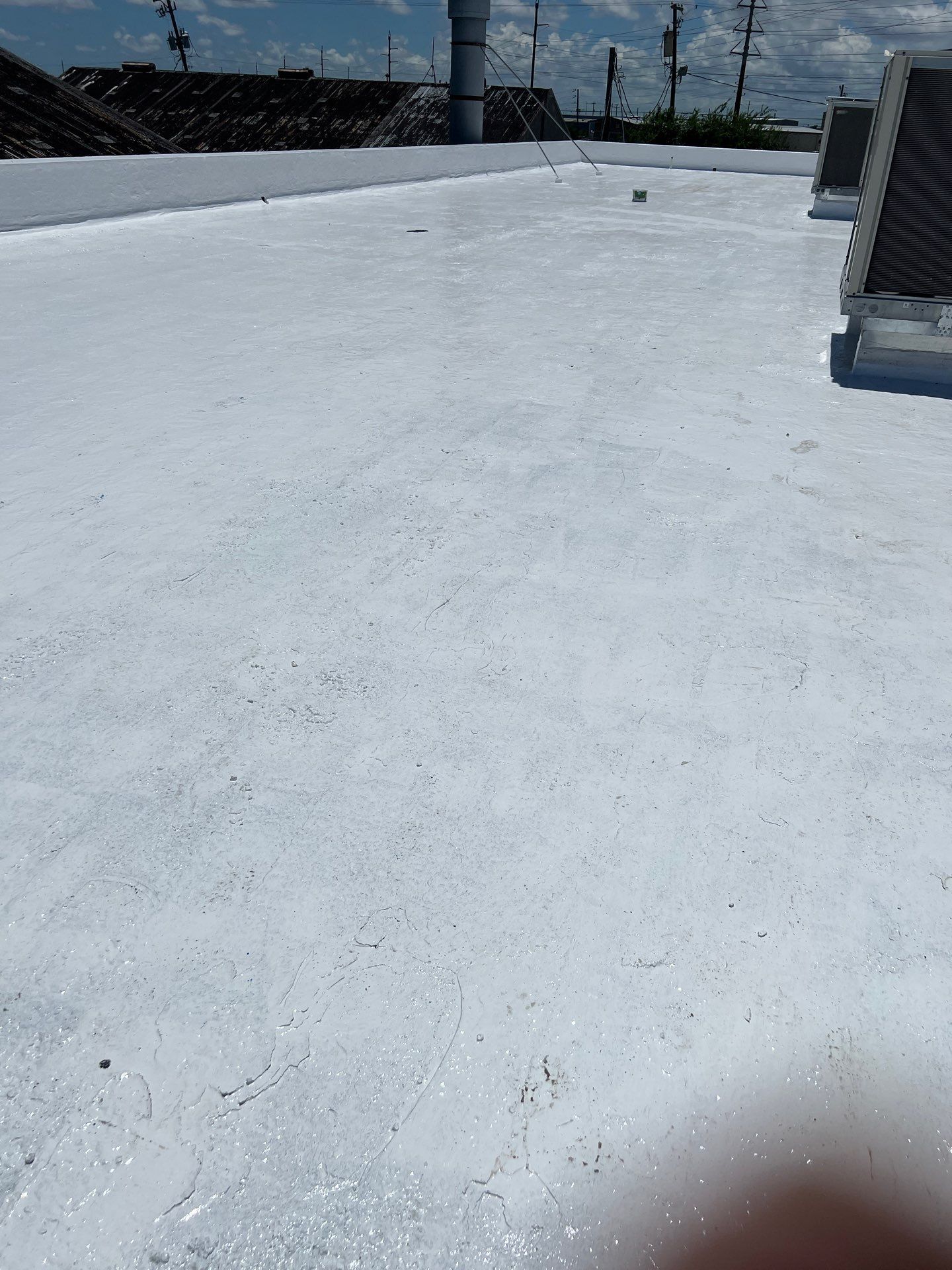 Dirty leaking Gravel Roof by Bayfront Roofing and Construction