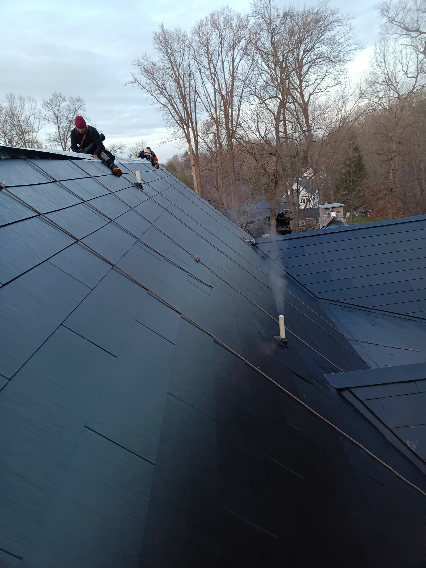 Tesla Solar Roof  using Tesla Powerwall by American Home Contractors