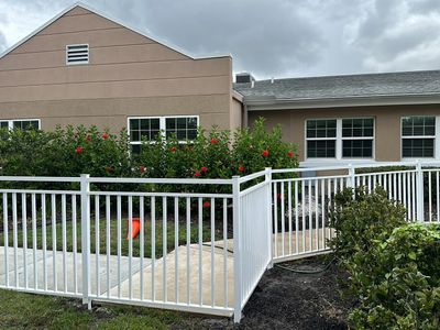 Aluminum Fence Installation using White 3 Rail Aluminum Fence