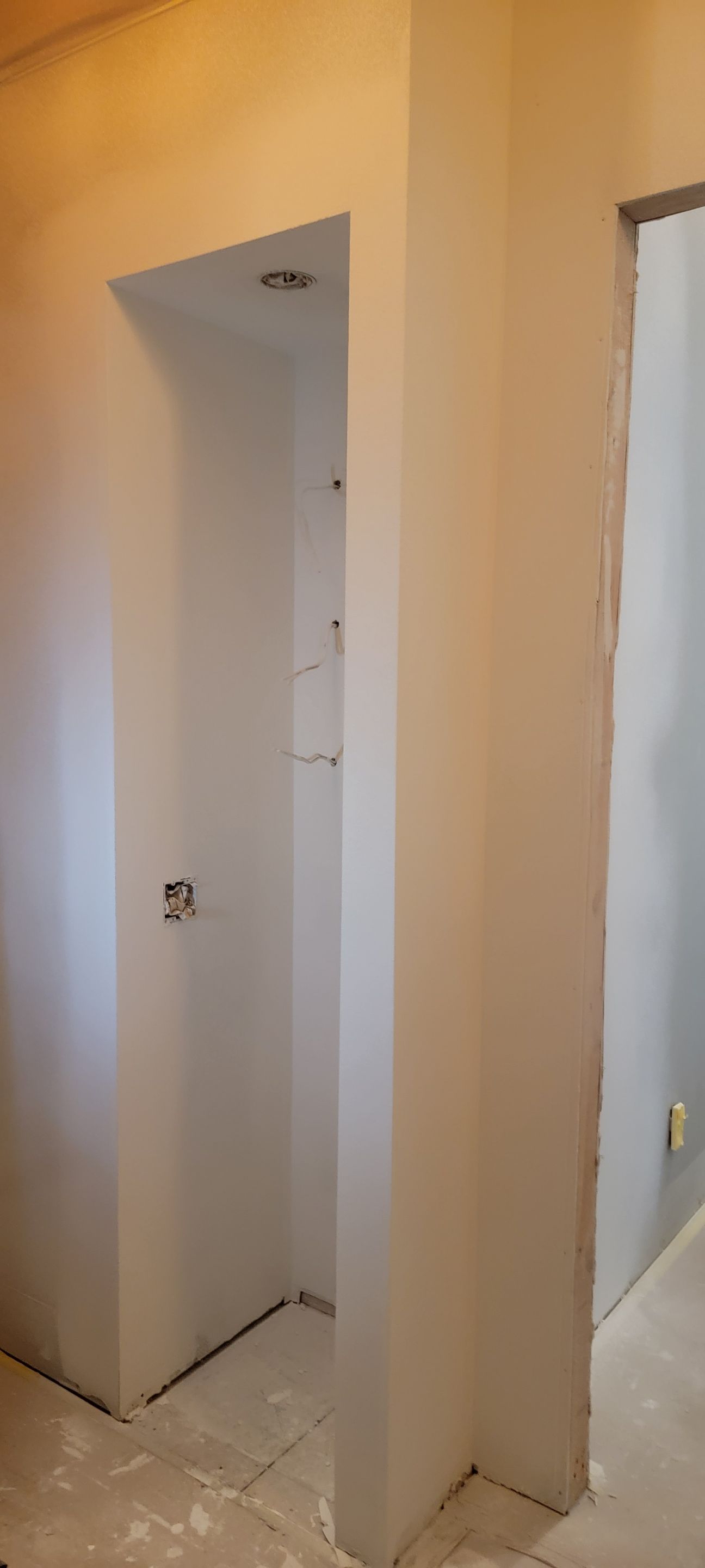 Closet transformation to coffee nook with custom shelves and LED lighting. by Crm Services Llc