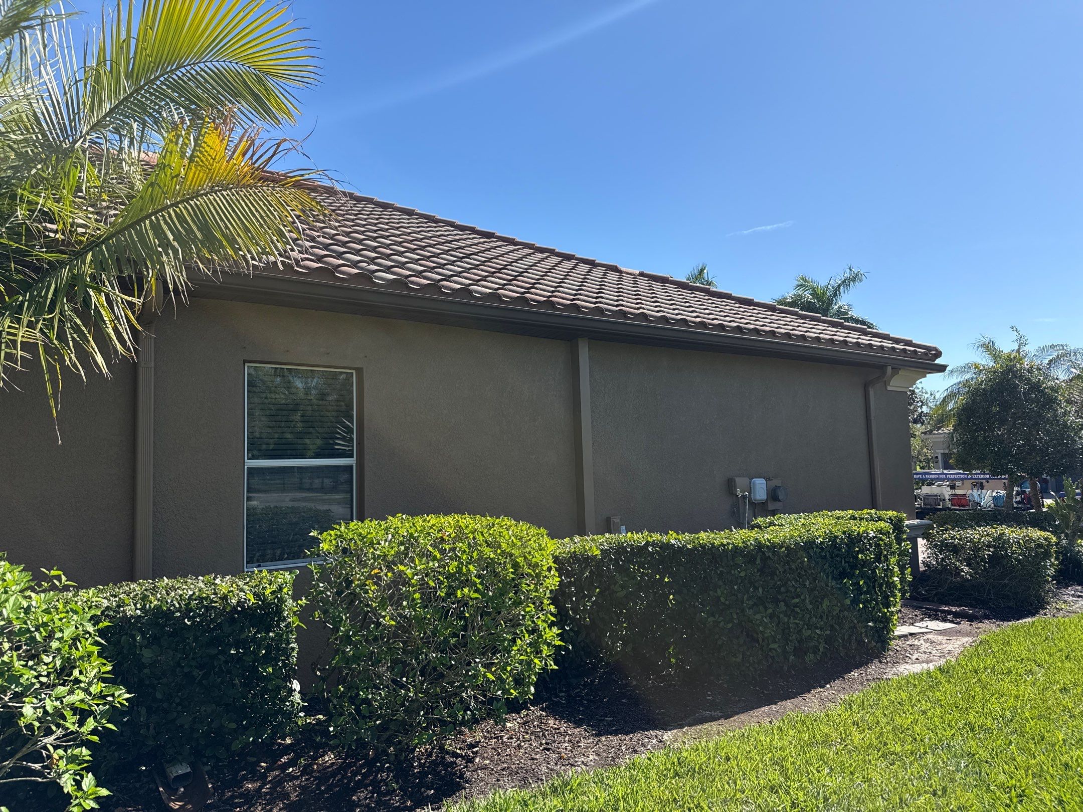 This project focused on a full gutter clean-out to restore proper water flow and prevent overflow issues.  Our scope of work included: 	•	Removing heavy leaf and pollen buildup from the gutter system 	•	Clearing out clogged sections along the rear gutters near the pool cage, where debris tends to accumulate more heavily 	•	Inspecting and cleaning the front gutter guards, which had several blocked areas restricting water flow 	•	Ensuring all downspouts and channels were flowing properly after service  Even with gutter guards installed, debris like pollen, shingle grit, and fine organic matter can still build up over time—especially in Florida’s environment. Regular maintenance helps prevent water damage, overflow, and staining on exterior surfaces.  Another thorough job completed by Sunshine AquaWash® – keeping homes protected from top to bottom. by Sunshine AquaWash