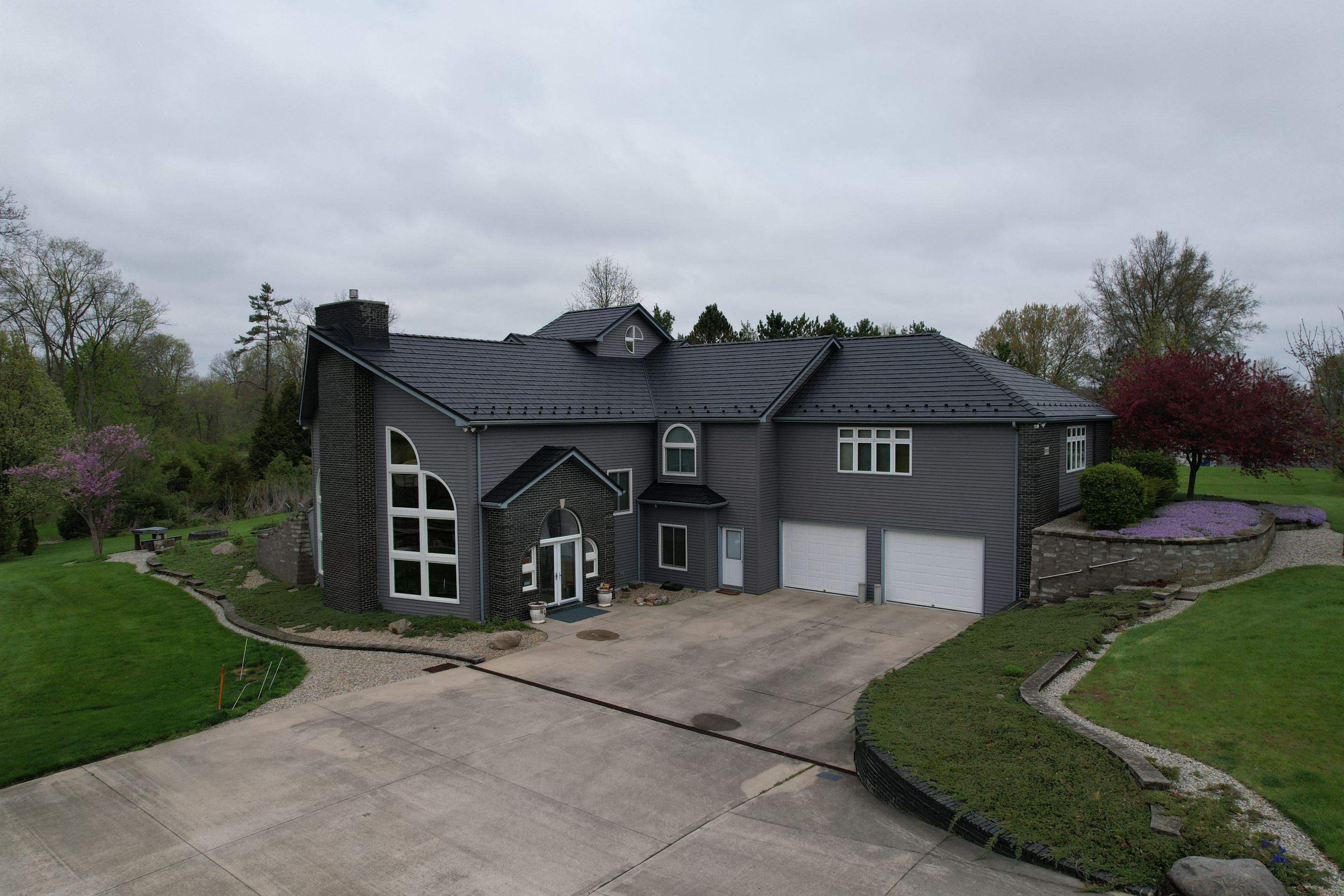 Residential Roofing Installation using Vic West Nothridge Slate by 4Ever Metal Roofing