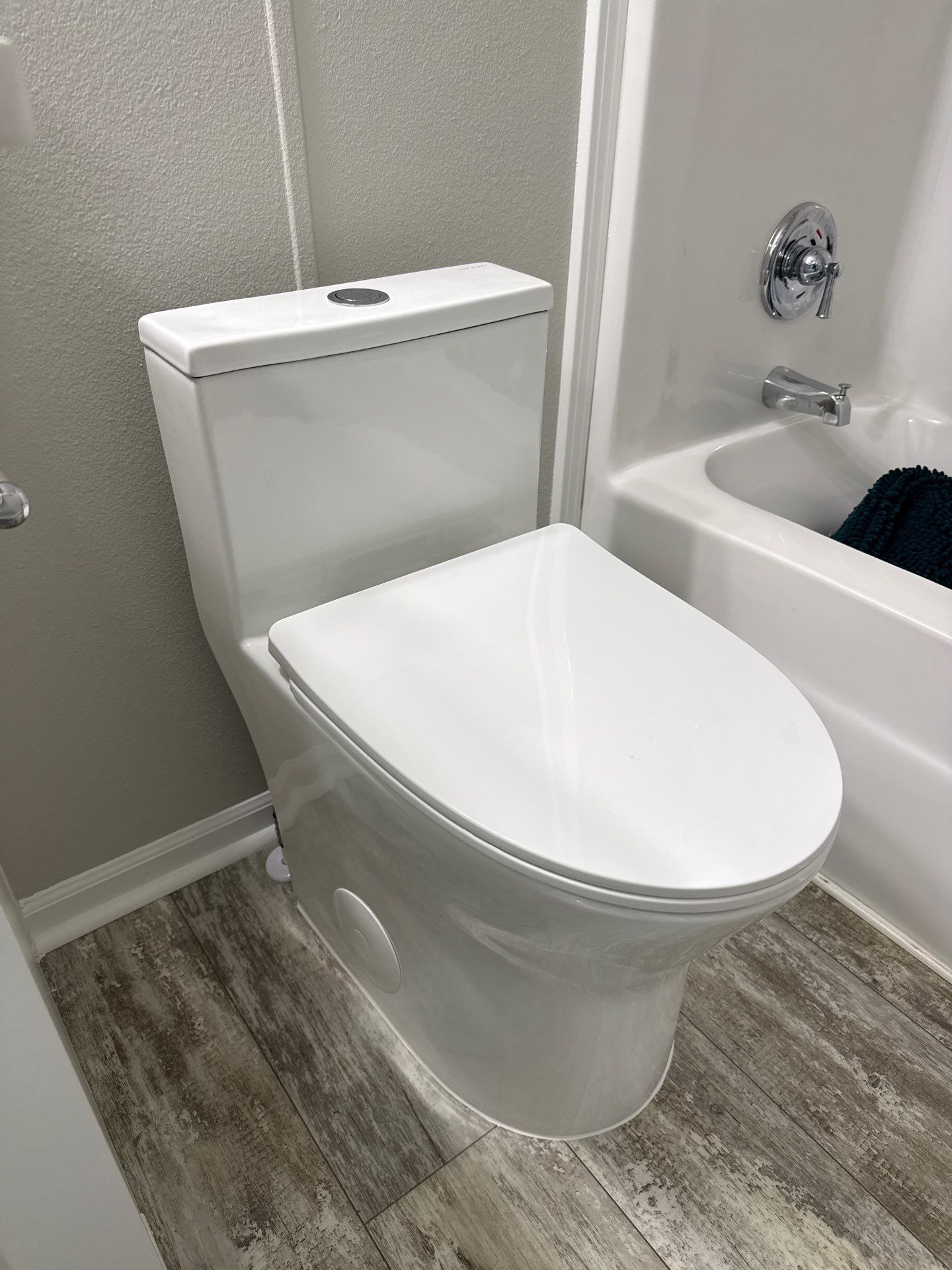 One Piece toilet install by Elite Trade Services LLC