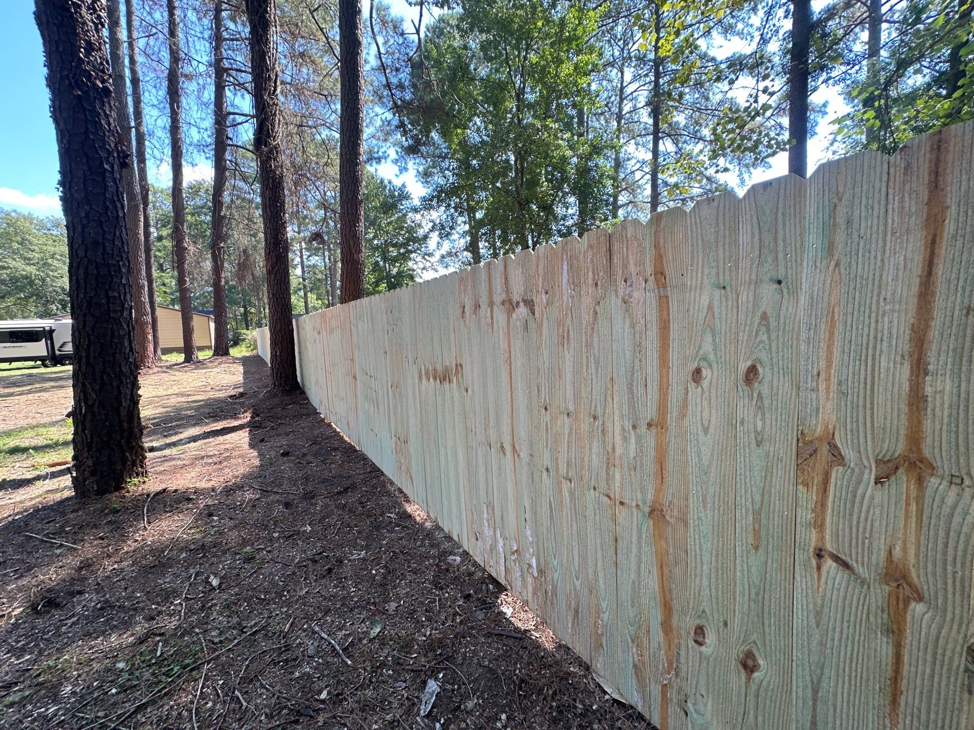 Custom Pressure-Treated Wood Privacy Fence Installation in Laurinburg by Superior Fence and Rail