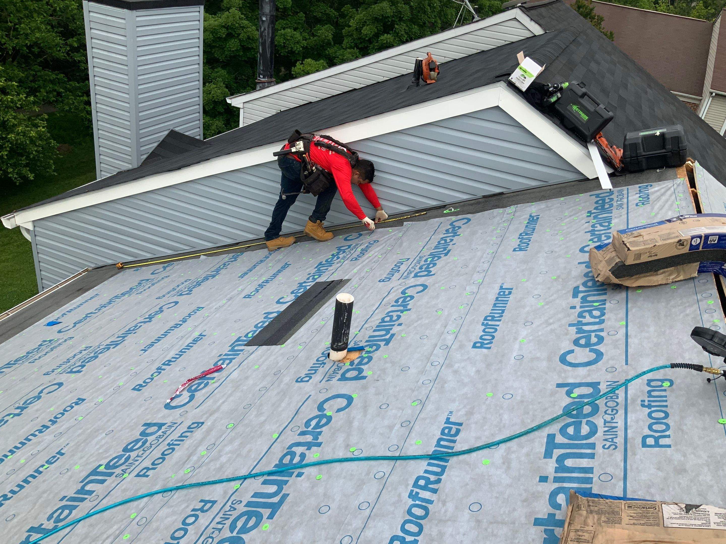 Residential Roofing Installation using XT-25 Color Moire Black by Alpha Design Services