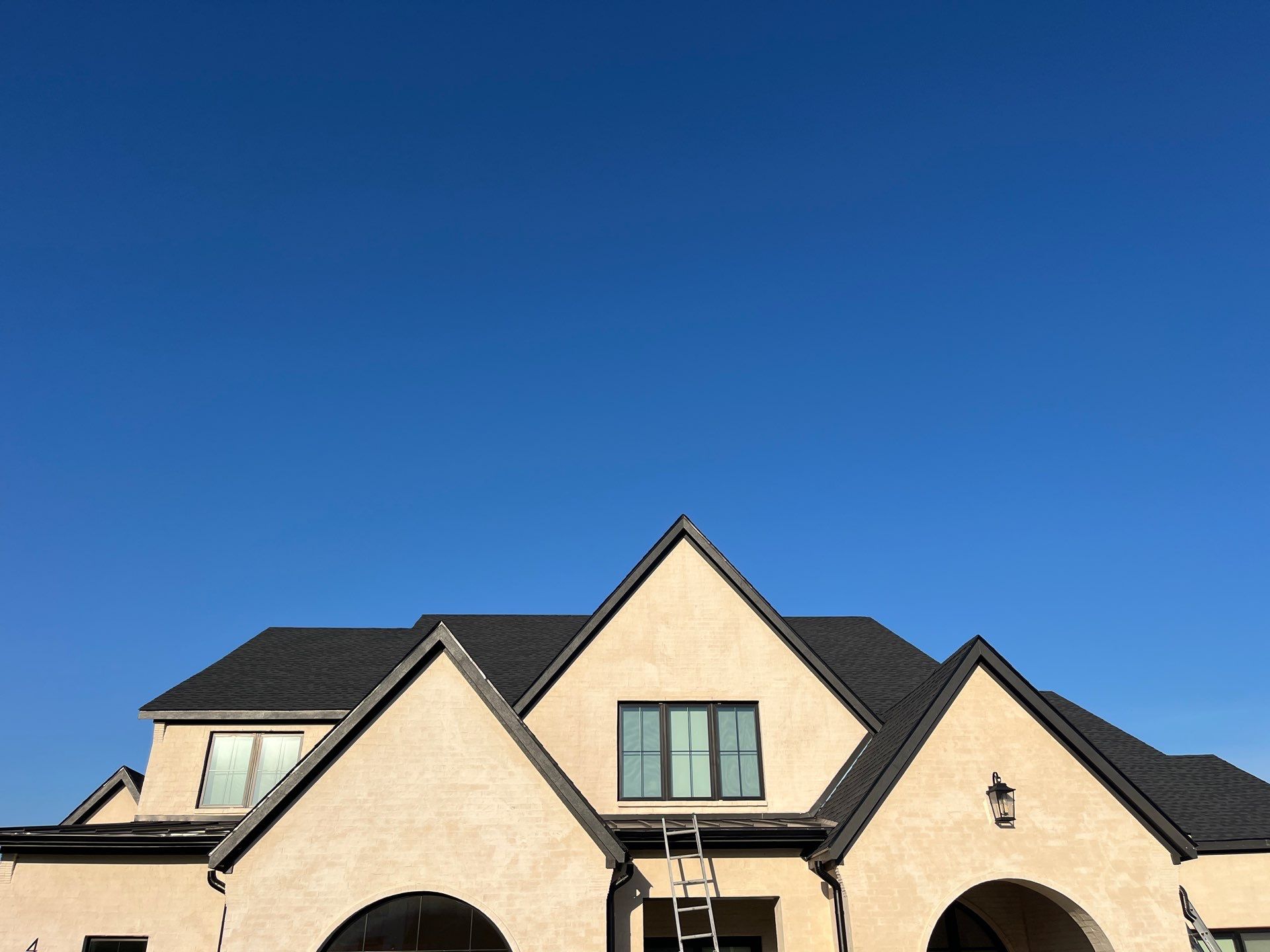 GAF-Charcoal with White Brick  by Tejas Roofworks + Restoration