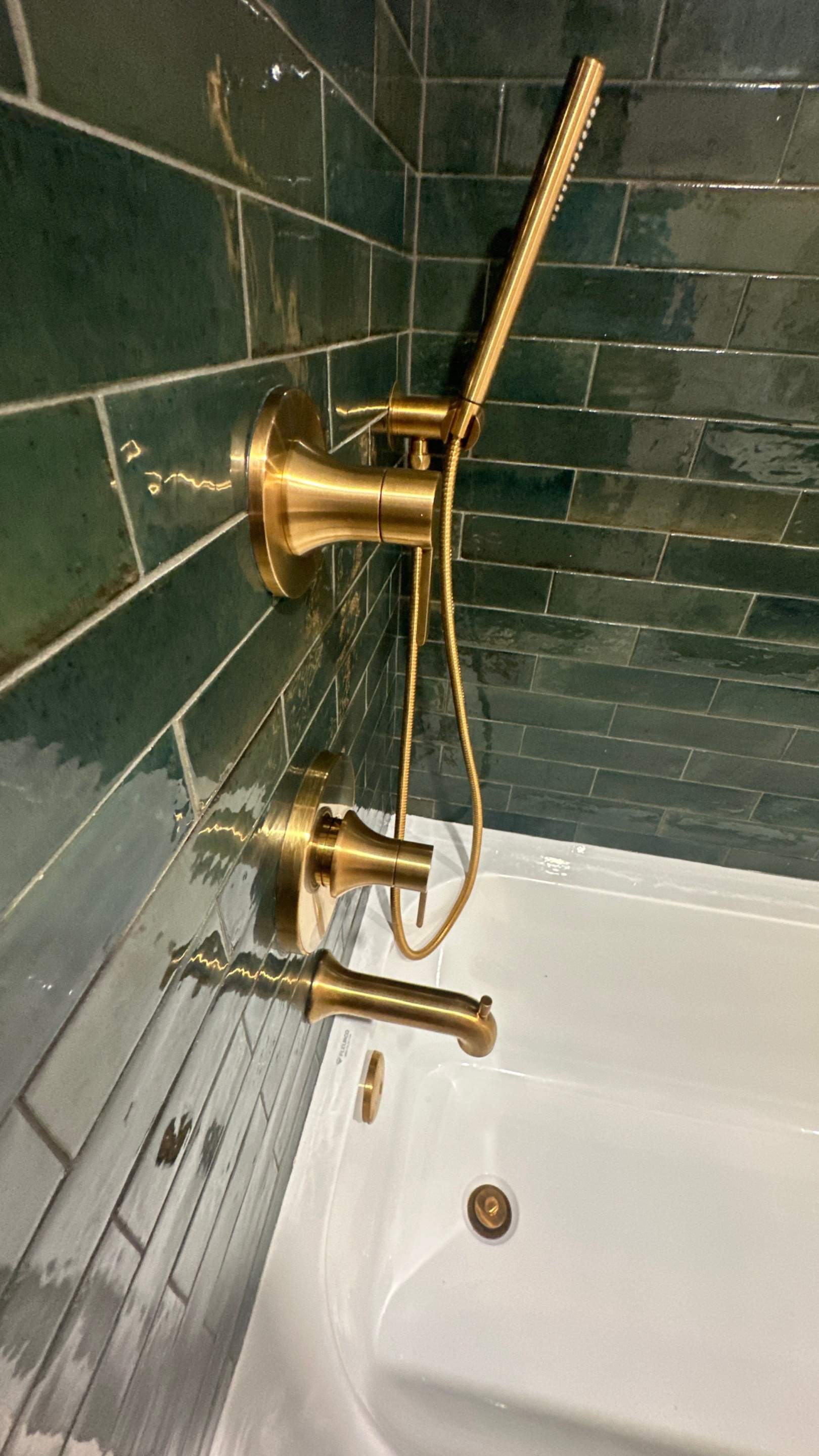 Brandt Double Bathroom Remodels by Integrity Tile and Home LLC