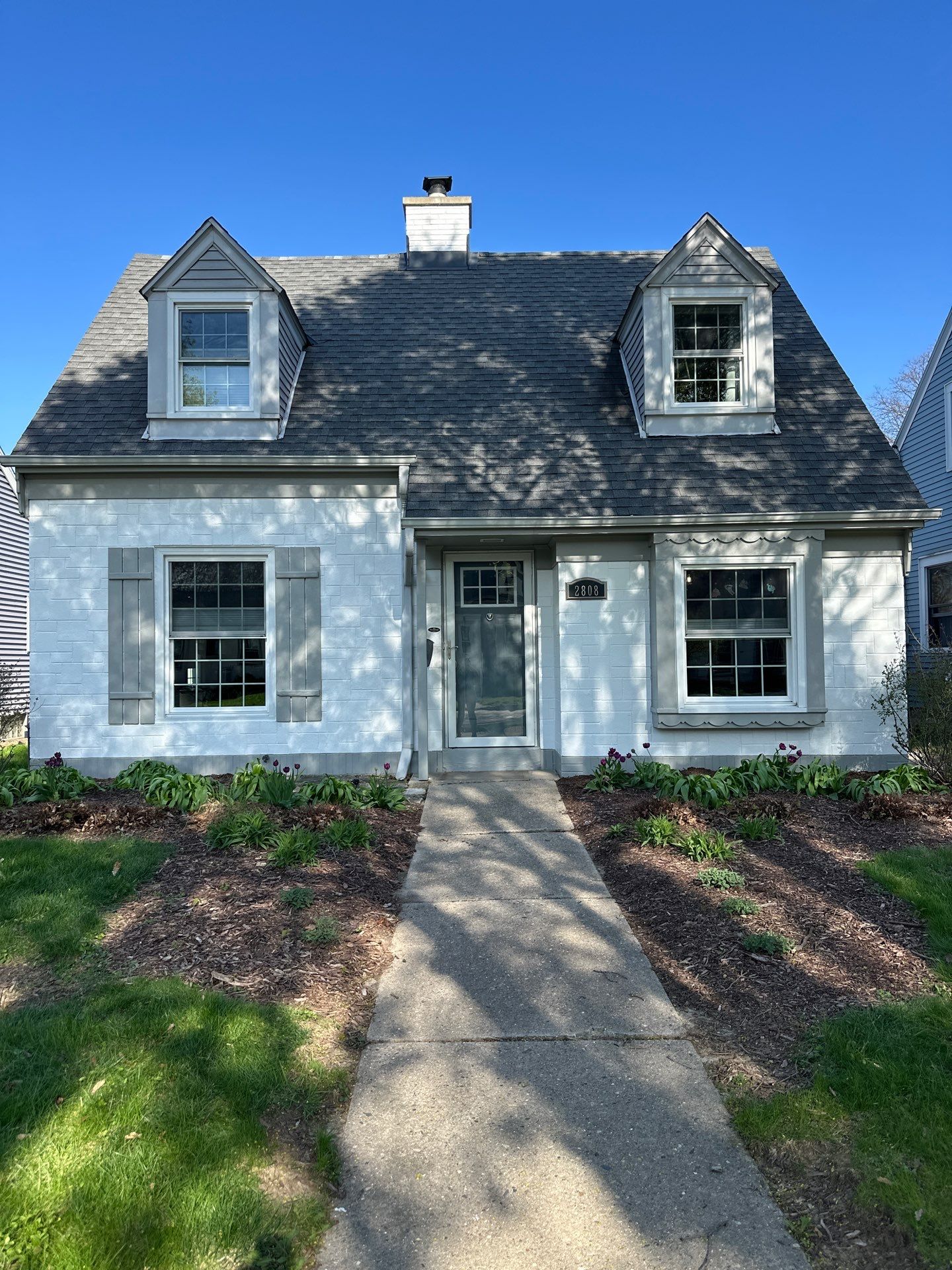 Milwaukee Cape Cod Exterior Renovation and Siding Replacement by OCS Contracting Services