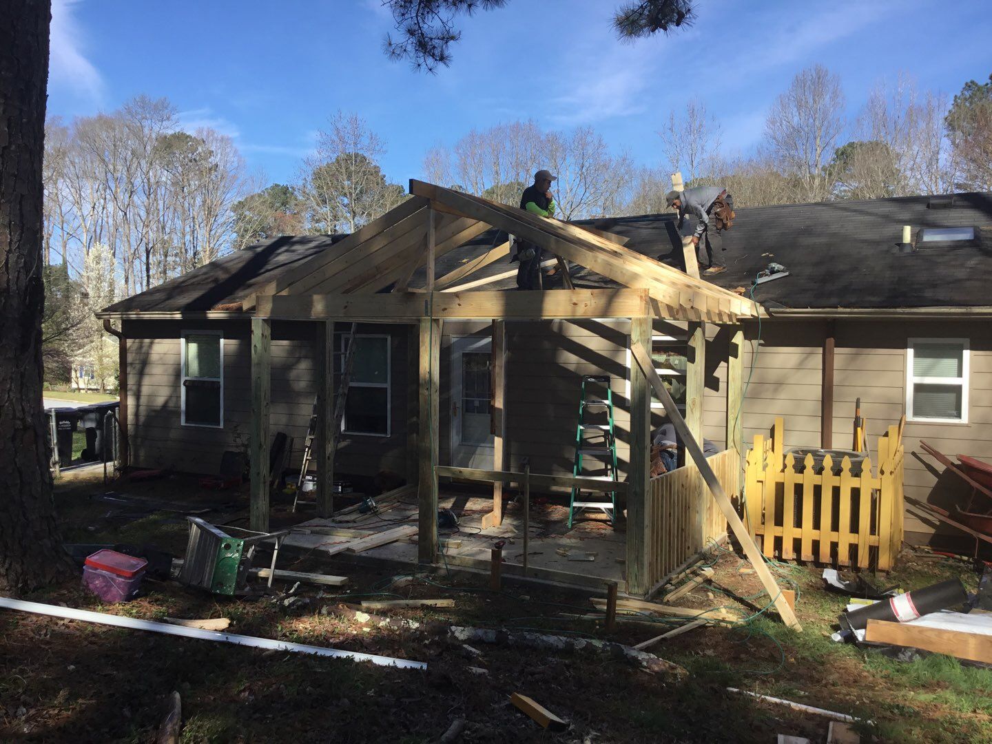 Screened Porch Construction with Vaulted Wood Ceiling in Douglasville by Swift Home Renovations