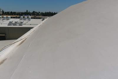 Single-ply restoration system using Conklin Benchmark/PUMA XL fabric and coating