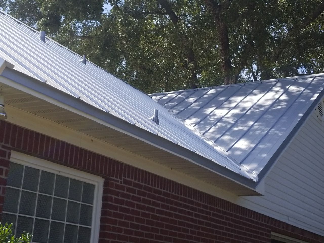 Residential Roofing Installation using Metal roofing by American Roofing & Construction LLC