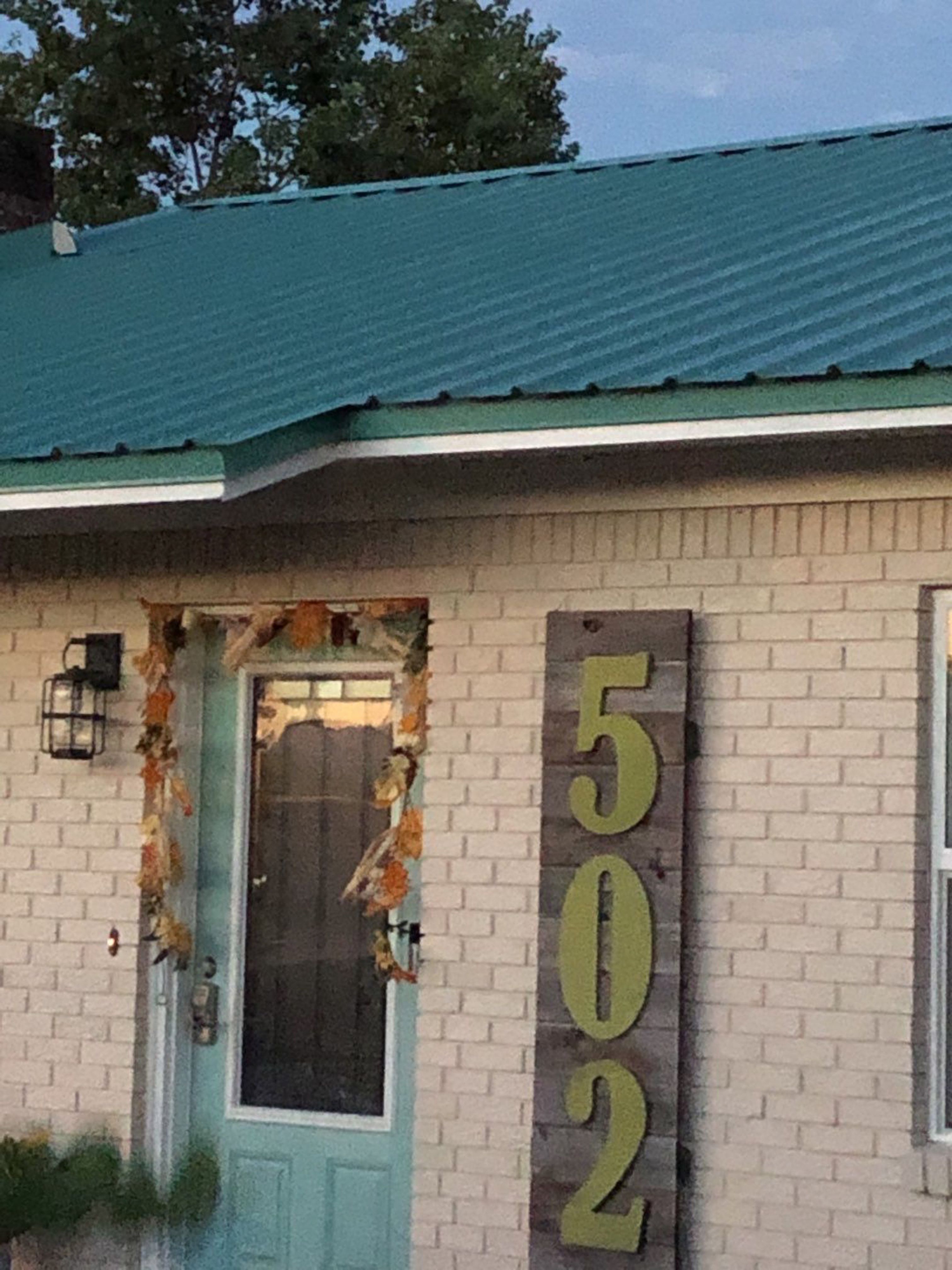 Gutter Installation using K-Style White Seamless Gutters by Gutter Professors