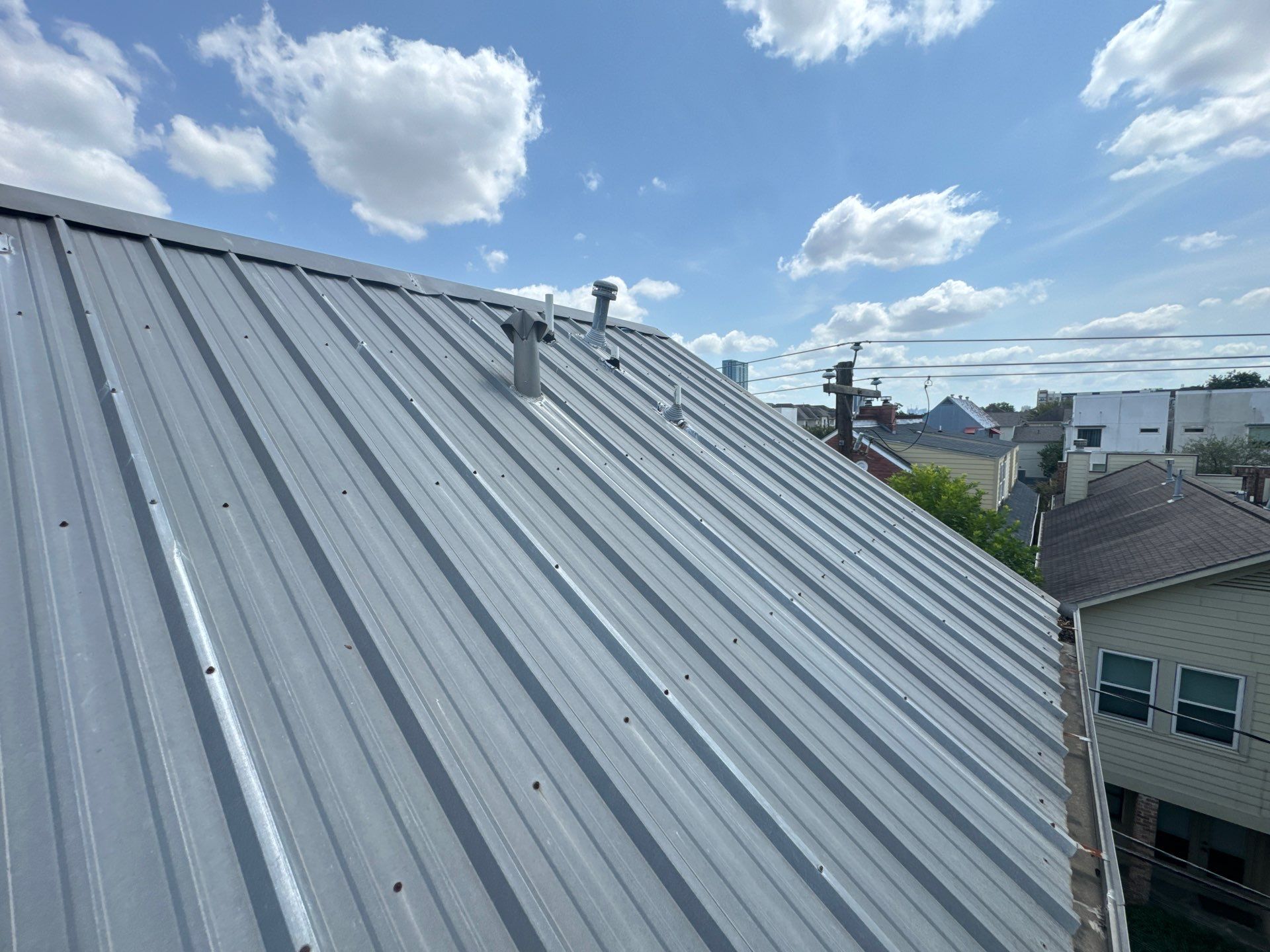 Metal Roof Leak Repair by Associates Roofing Unlimited