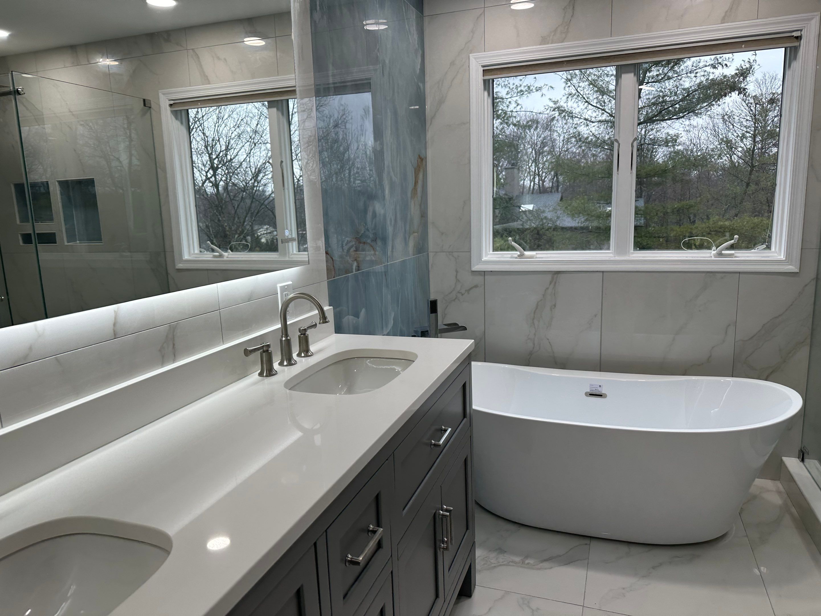 Bathroom Remodel using Tile by Home Concepts Construction