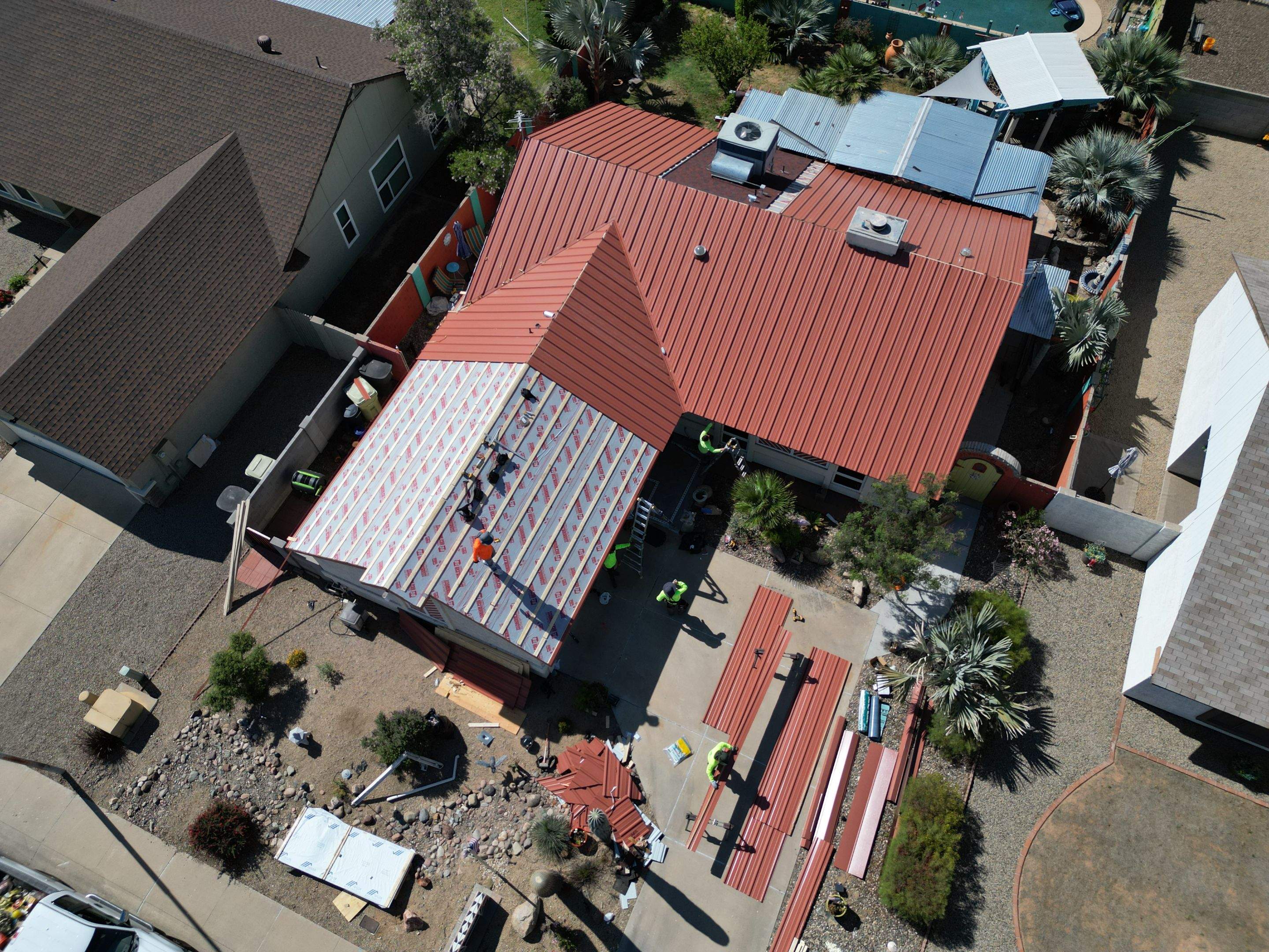 Terra Cotta Exposed Fastener by Reimagine Roofing