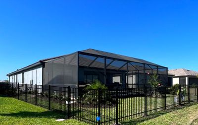 Aluminum Fence Installation using Black 3 Rail Aluminum Fence
