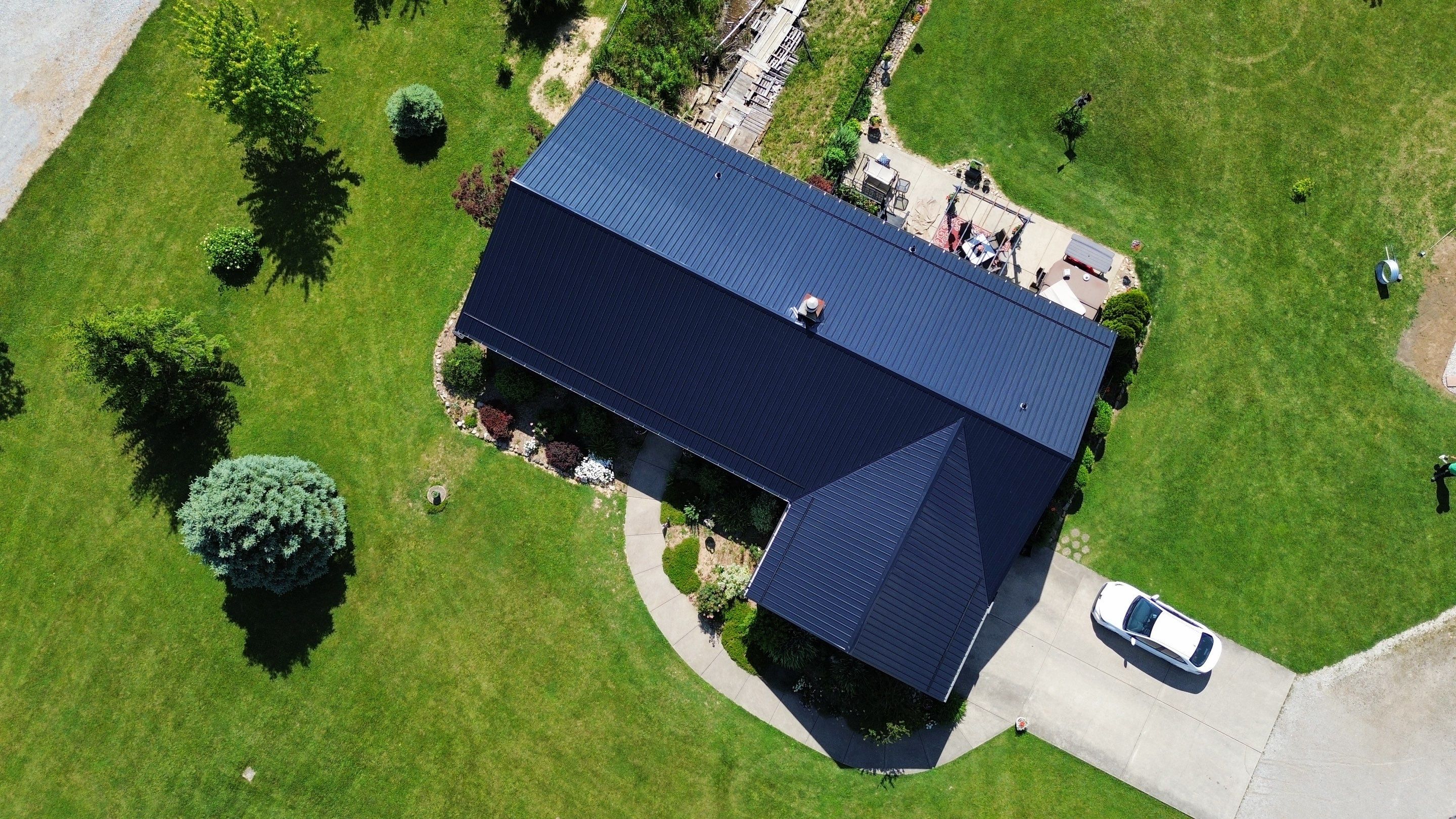 Residential Roofing Installation using Perfromance Panel Metal - Black by RoofX 