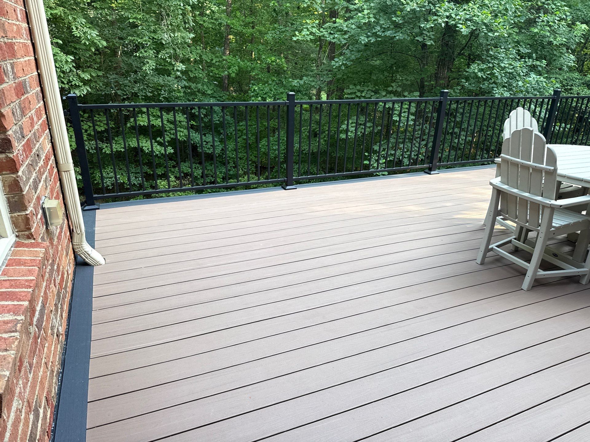 Deck Resurface using Deckorators Summit Series and Deckorators ALX Contemporary railing by Nelson Exteriors 