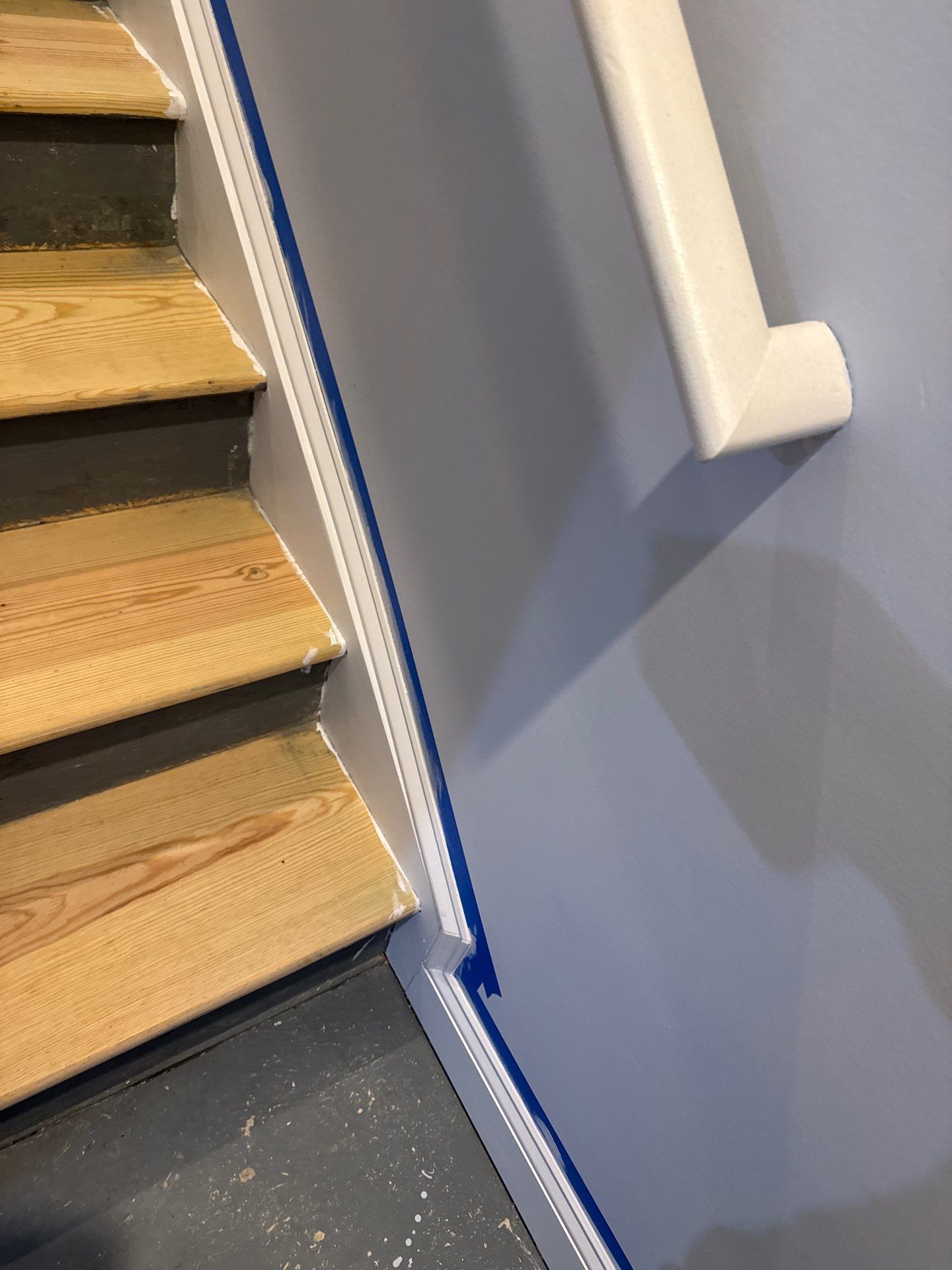 Stairway Installation using t vinyl stair tread and reversibleriser by La Bendicion Contruction Llc